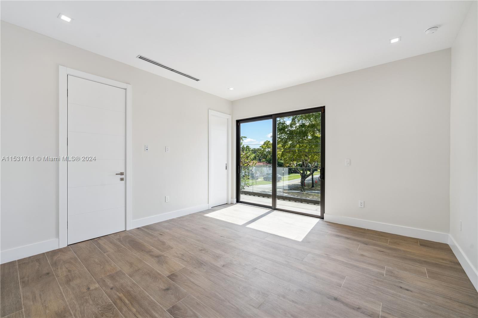 BEDROOM #5, 2nd Flr w/ Balcony facing Front of Structure (1)