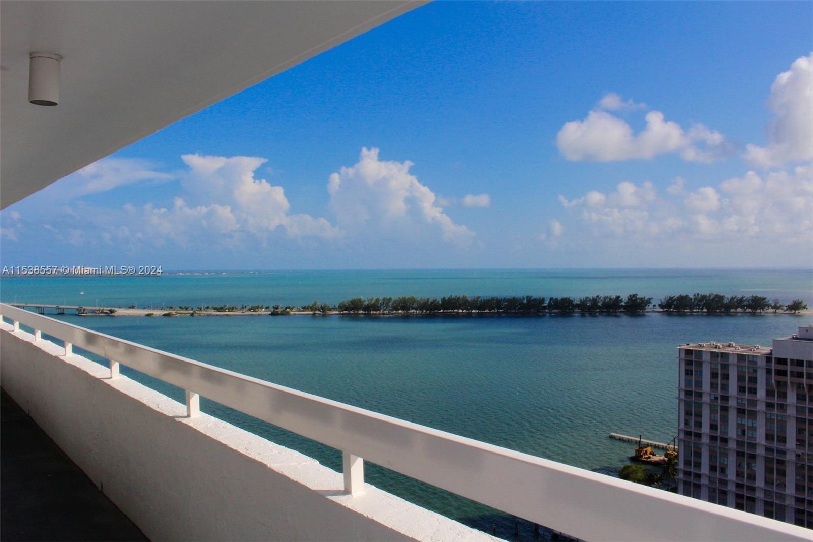 Luxury Waterfront Building, floor-to-ceiling glass provides a beautiful wide open view of Key Biscayne, Coconut Grove and the Gables to the South. Endless Balcony is accessible from every room with magical views to Brickell's skyline. Full Service building which offers: tennis, bay-front pool, Jacuzzi, sauna, gym, BBQ area, party room, door man, valet and more. Walking distance to Mary Brickell Village, Publix, Bayside and Metro Mover. Unit features 2 parking spaces: P3-265 and P3-333.