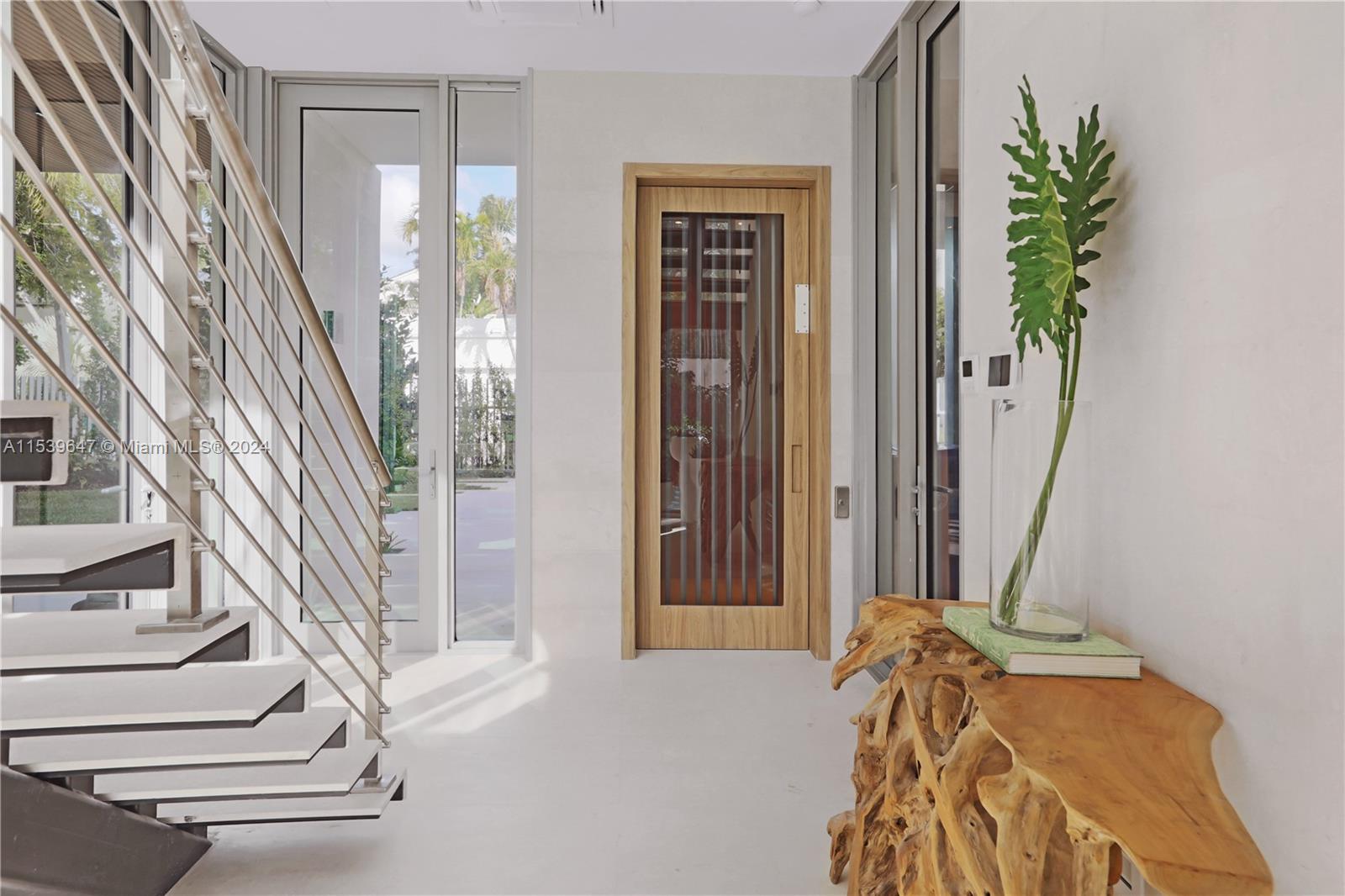 Ground Level Landing/Foyer and Private Elevator