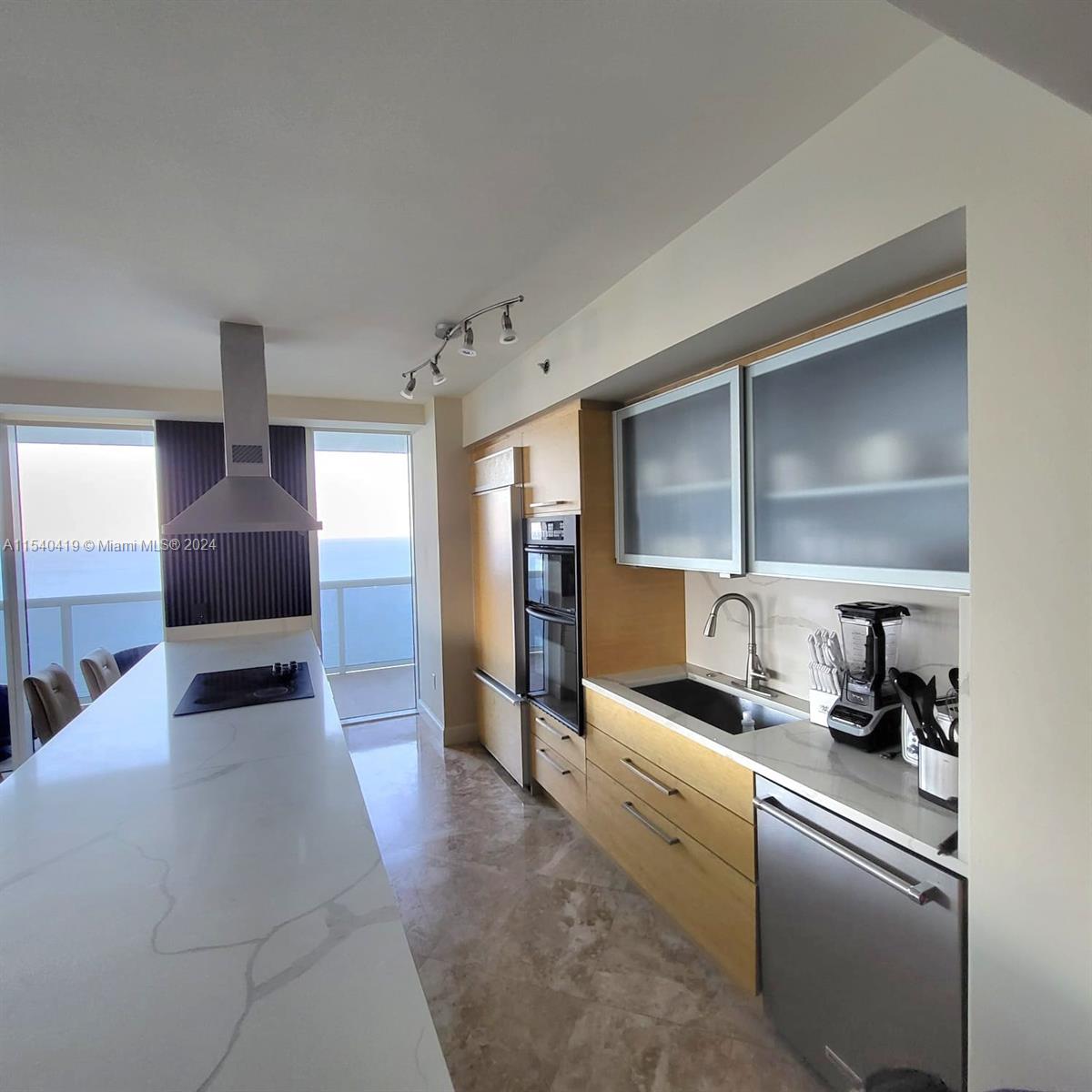 Waterfall Quartz kitchen island.