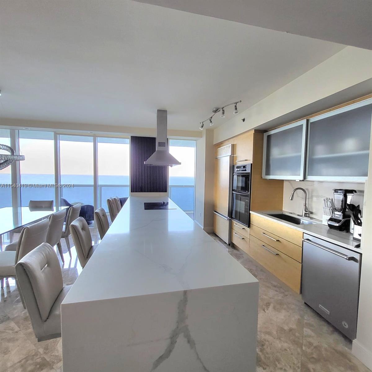 Waterfall Quartz kitchen island.