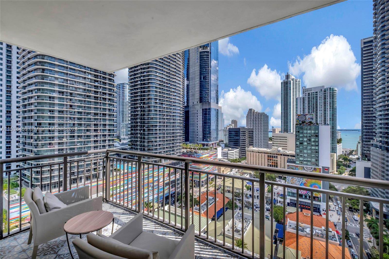 Step into luxury living in this fully furnished, turn-key ready unit nestled in the heart of Brickell Miami's Mary Brickell Village. Just steps from Brickell City Center and the metro rail station, this meticulously upgraded residence showcases over $70,000 in enhancements, including bedroom flooring, custom closets, balcony tile, stylish light fixtures, furniture and decorations. Revel in stunning daytime bay views and captivating city lights at night from this perfectly positioned home. Enjoy seamless access to high-end dining, fitness facilities, and beauty boutiques, epitomizing convenience and sophistication. Don't miss this opportunity to embrace luxury living in one of Miami's most sought-after neighborhoods—schedule your private viewing today!