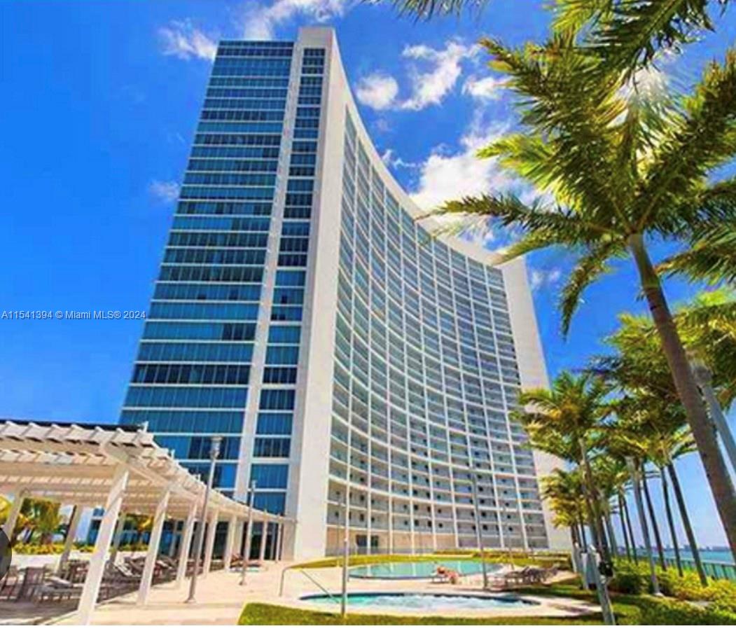 Gorgeous 1 Bed, 1.5 Bath with great Bay views! Floor-to-ceiling impact windows. It is very bright & spacious and very well maintained. Located in the heart of Miami, steps to Midtown, Design District & Wynwood. The building features 24-hour concierge& security, valet parking ... 2 pools, a fitness center, a sauna, a movie theater, a convenience store & more!!!