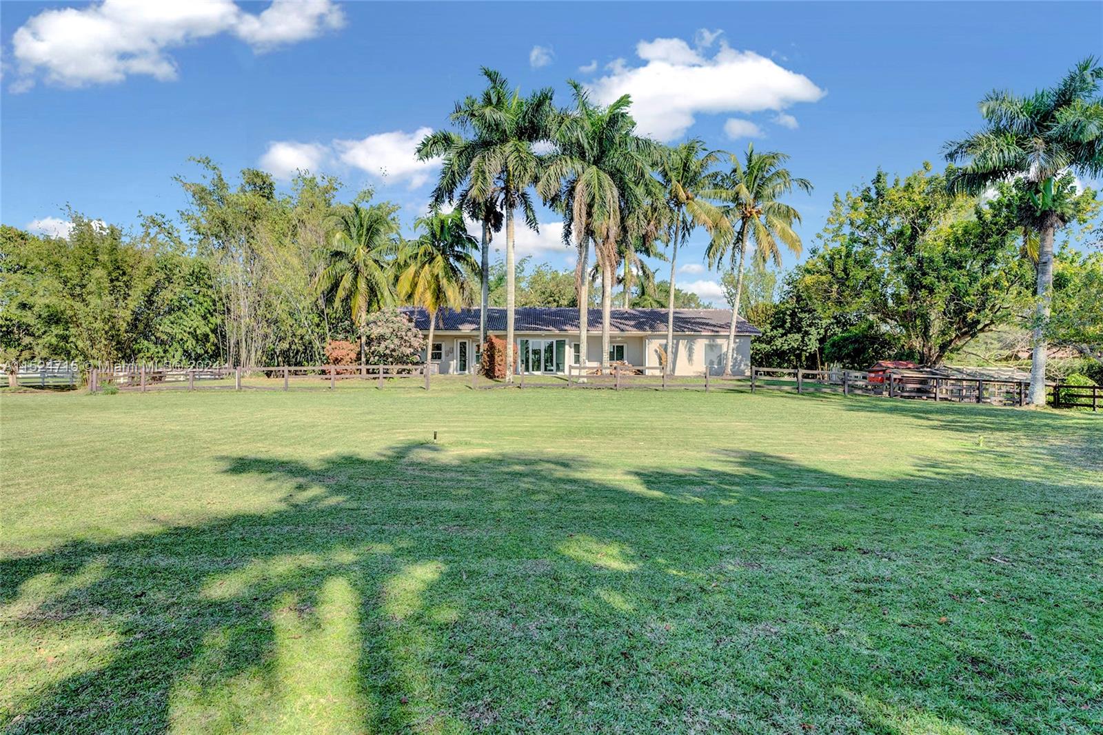 Overview of beautiful private entrance through cul de sac