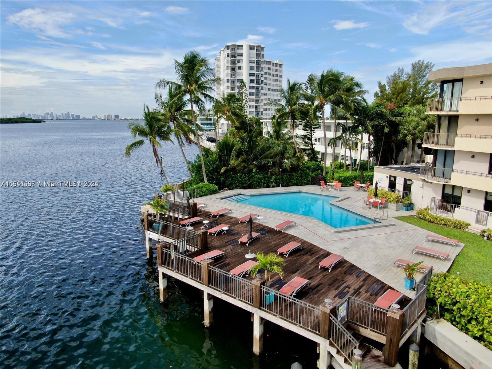 Welcome Home - Hard to find, beautiful and spacious 3 Bedroom/2.5 Bath on the water. This lovely 3/2.5 condo is located in the highly sought-after Mariner's Bay Condominium on the North Miami intercoastal. Beautiful 4-story building, immaculate landscaping, security, gated grounds, with a bayside pool, exercise room, club room, sauna/steam spa room, and more! Home offers 2,145 sq ft. of living space with all bedrooms in a split layout, renovated kitchen with breakfast nook, spacious double balconies, washer/dryer in unit, and 2 assigned parking spaces. Nestled just minutes to great shopping, WholeFoods, Publix, Costco, Target, fresh markets, restaurants, parks, and Miami's best beaches. Your paradise awaits. Easy to show!