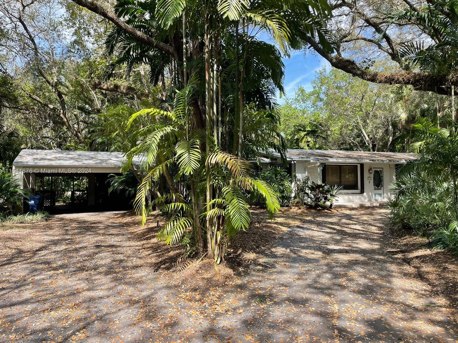 This 4-bed, 3-bath, plus den, North Pinecrest FL home sits on a one-acre lot. A lush garden, pool, and spacious yard with numerous trees offer a serene oasis, striking a balance between city living and nature. The proximity to the best schools in the area adds to the appeal of the location, making it an ideal choice for families with children. Ample indoor and outdoor entertaining space, coupled with generous parking, makes it ideal for quality family time and gatherings. A charming, safe home, close to Dadeland mall and US1 offering a perfect blend of comfort, convenience and natural beauty in the sought after North Pinecrest area.