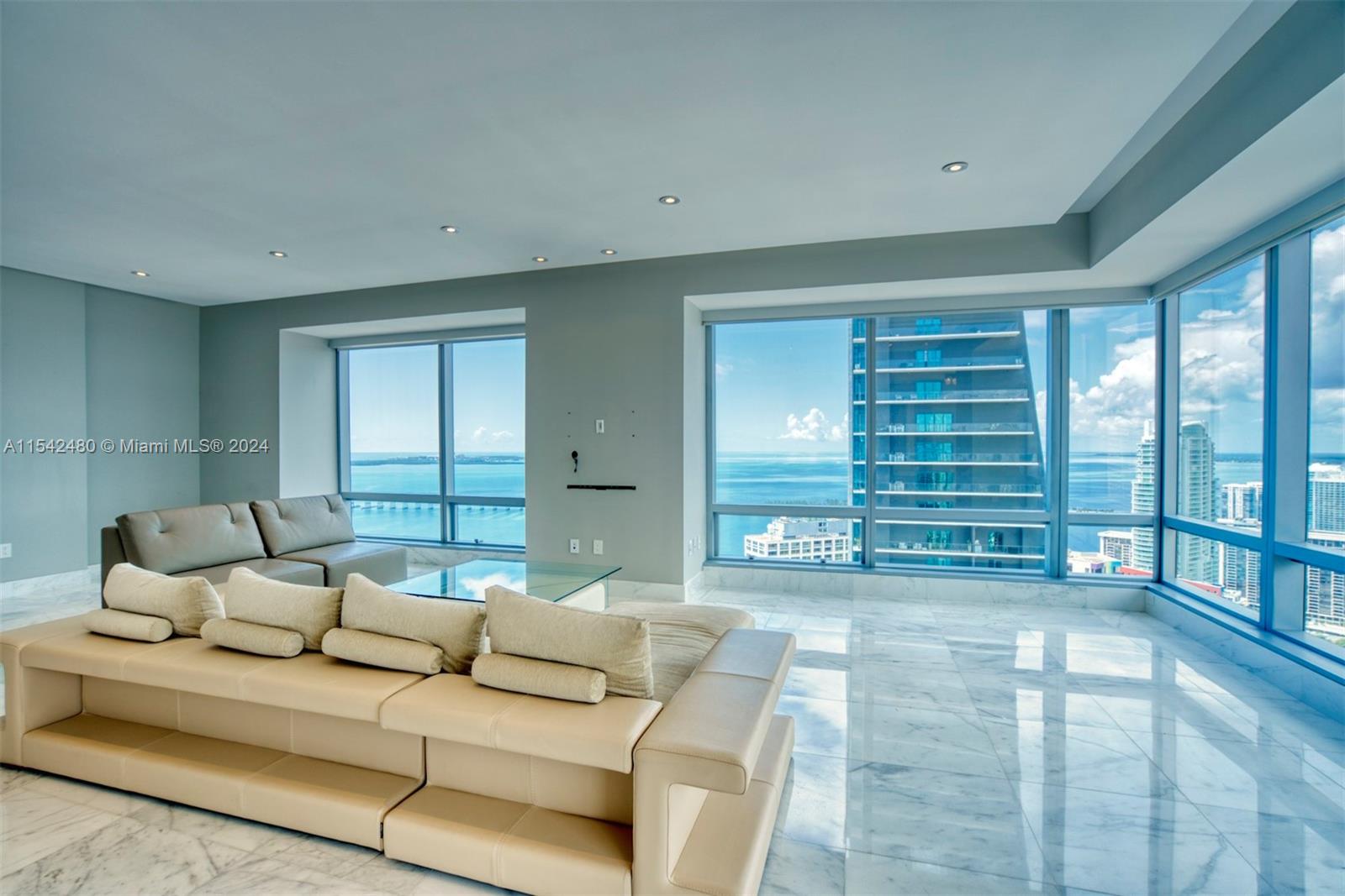 This renovated & upgraded corner residence on the 46th floor offers stunning bay, ocean and city views as far as the eye can see. Top-of-the-line finishes, Carrara marble and wood floors, an amazing open kitchen with quartz countertops and top-of-the-line appliances, electric blinds, custom-built closets, a storage unit and more! Luxurious retreat offered by the building and its staff including 3 pools with cabanas, room service, restaurant, 50,000 sq.ft. of gym and spa, owner’s lounge, 24-hour concierge, valet parking and security.