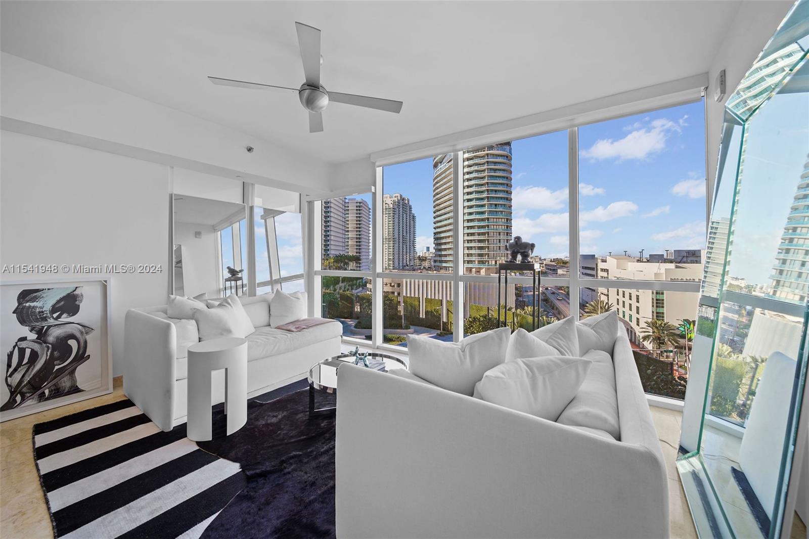Step into luxury with this bright 1-bed, 1.5-bath residence at the coveted Icon in Miami Beach's popular South of Fifth neighborhood. Revel in natural light streaming through floor-to-ceiling windows. Experience the convenience of in-unit washer/dryer, an assigned parking space, and complimentary valet for guests. Indulge in 5-star amenities, including a pool-floor restaurant, spa/gym, and more. This is an invitation to a lifestyle where every detail reflects sophistication and comfort.