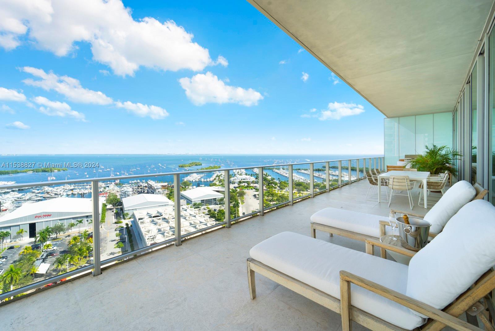 Nestled in the heart of Coconut Grove in the highly-sought after Grove at Grand Bay condominium, this 4-BD, 3.5-BA unit offers endless water views and a unique living experience for the most discerning buyers. Encompassing 4,933 SF with 12-ft floor-to-ceiling impact windows, the unit occupies a coveted spot in the South Tower's NE corner, with sweeping panoramic views of Biscayne Bay and the city. An impressive gourmet kitchen boasts an expansive center island, premium appliances, a gas cooktop, and ample counter space. The unit showcases high-end materials and finishes, exhibiting a sophisticated and refined ambiance. The open floor plan is ideal for displaying art collections and hosting guests. Incredible opportunity to own a unit in one of the most beautiful buildings in Coconut Grove.