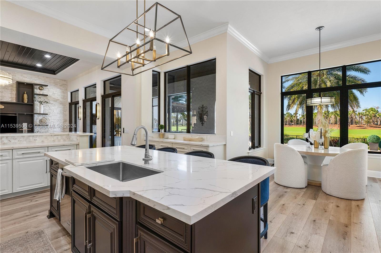 Kitchen view(quartz countertops) of the dining area and living room