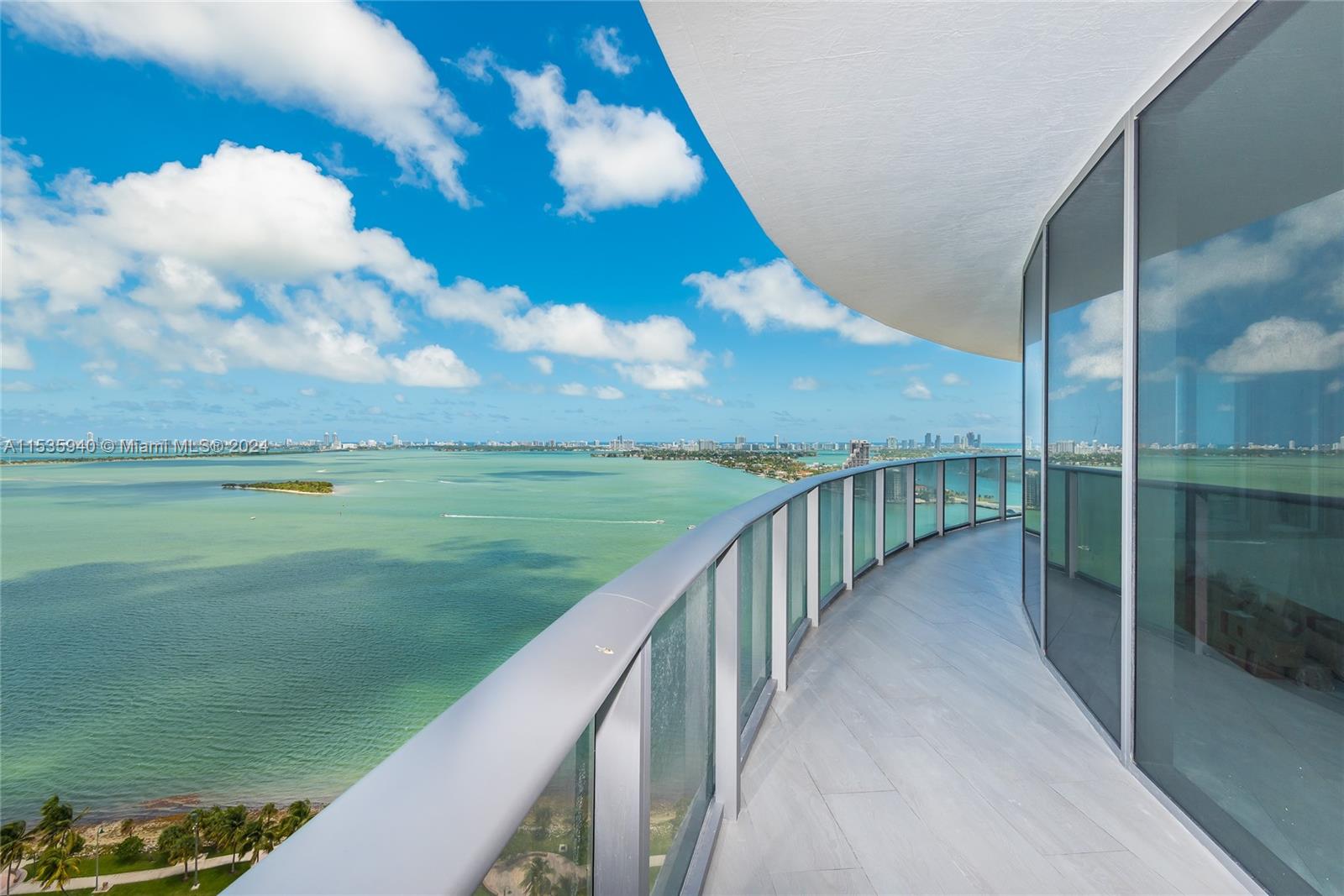 Live in luxury!!! Gorgeous and spacious unit with spectacular direct water views located in the heart of Miami's Art and Entertainment District. This 3 bedroom/ 4 full bathroom condo with DEN has top of the line finishes and appliances. All bedrooms have on suite bathrooms and custom closets. This unit features floor to ceiling windows with motorized window treatment throughout with blockout in the bedrooms and wrap around balcony. One of the BEST LINES in the building.