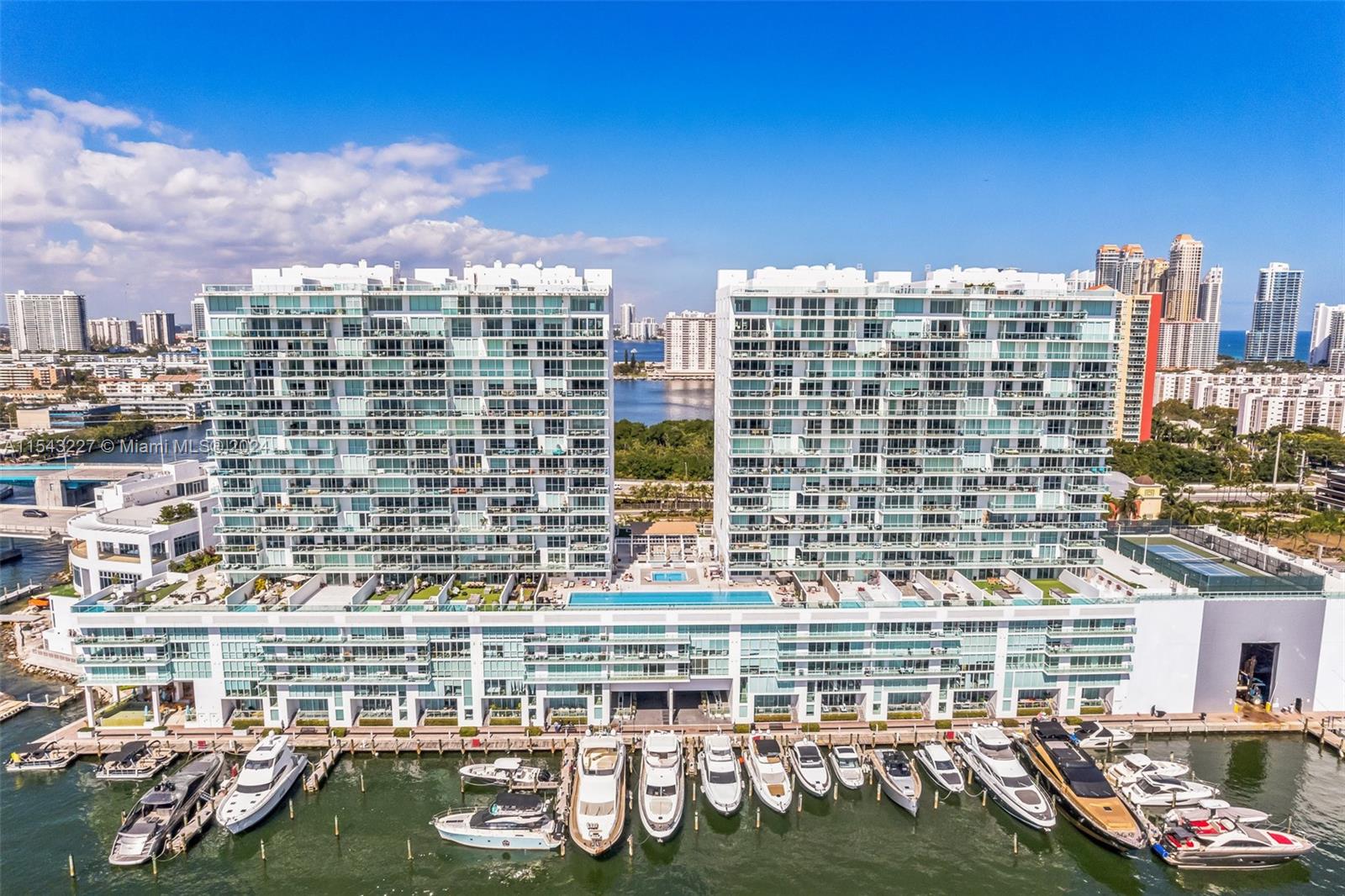 Indulge in the epitome of waterfront living with this stunning 2 Bed + Den | 3 Bath two-story unit in the coveted 400 Sunny Isles community. Perched majestically along the Intracoastal Waterway, this residence offers unparalleled views and upscale amenities. The open-concept layout is bathed in natural light, showcasing sleek modern finishes and panoramic vistas. The chef's kitchen features premium appliances. The secondary bedroom also boasts its own ensuite bathroom, ensuring privacy and comfort for guests or family members. Step outside to enjoy resort-style amenities including a pool, spa, and private marina. With beaches, dining, and shopping nearby, this is the ultimate Miami lifestyle. Schedule your viewing today!