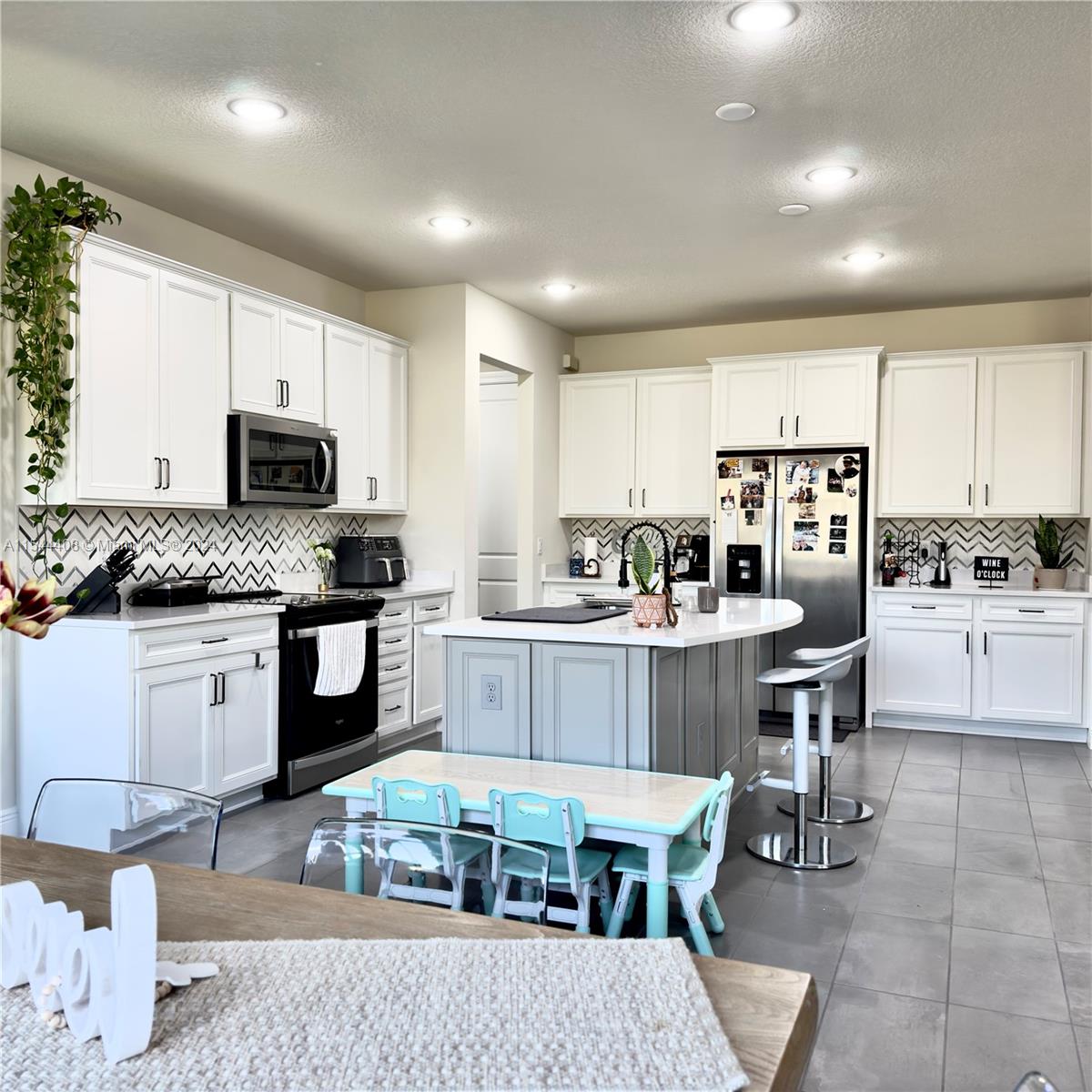 White shaker wood cabinets