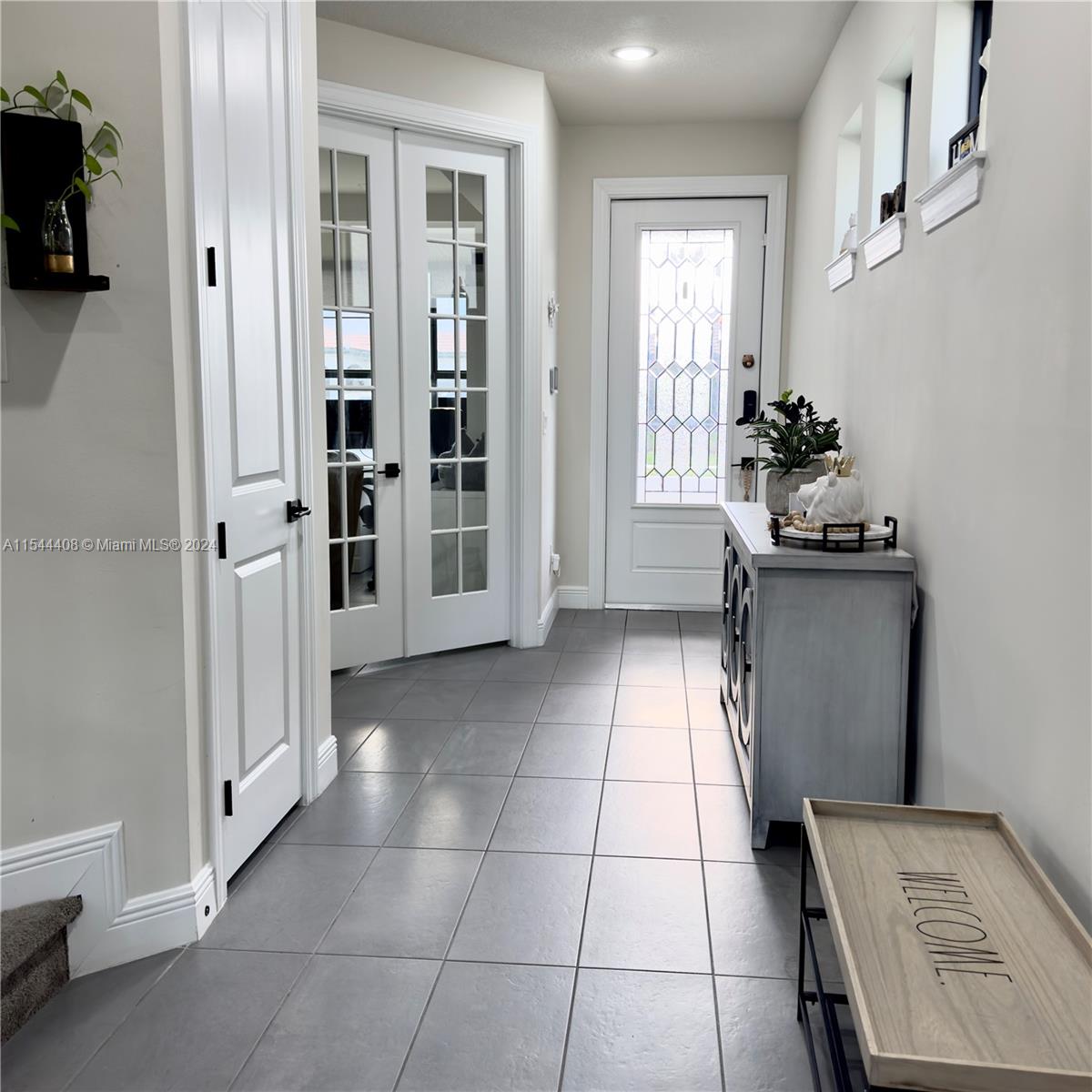 Entrance hallway office with french doors