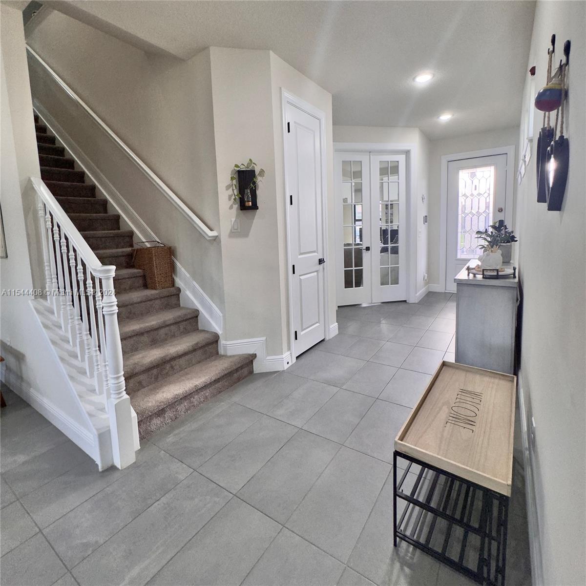 stairs, view of main door entrance