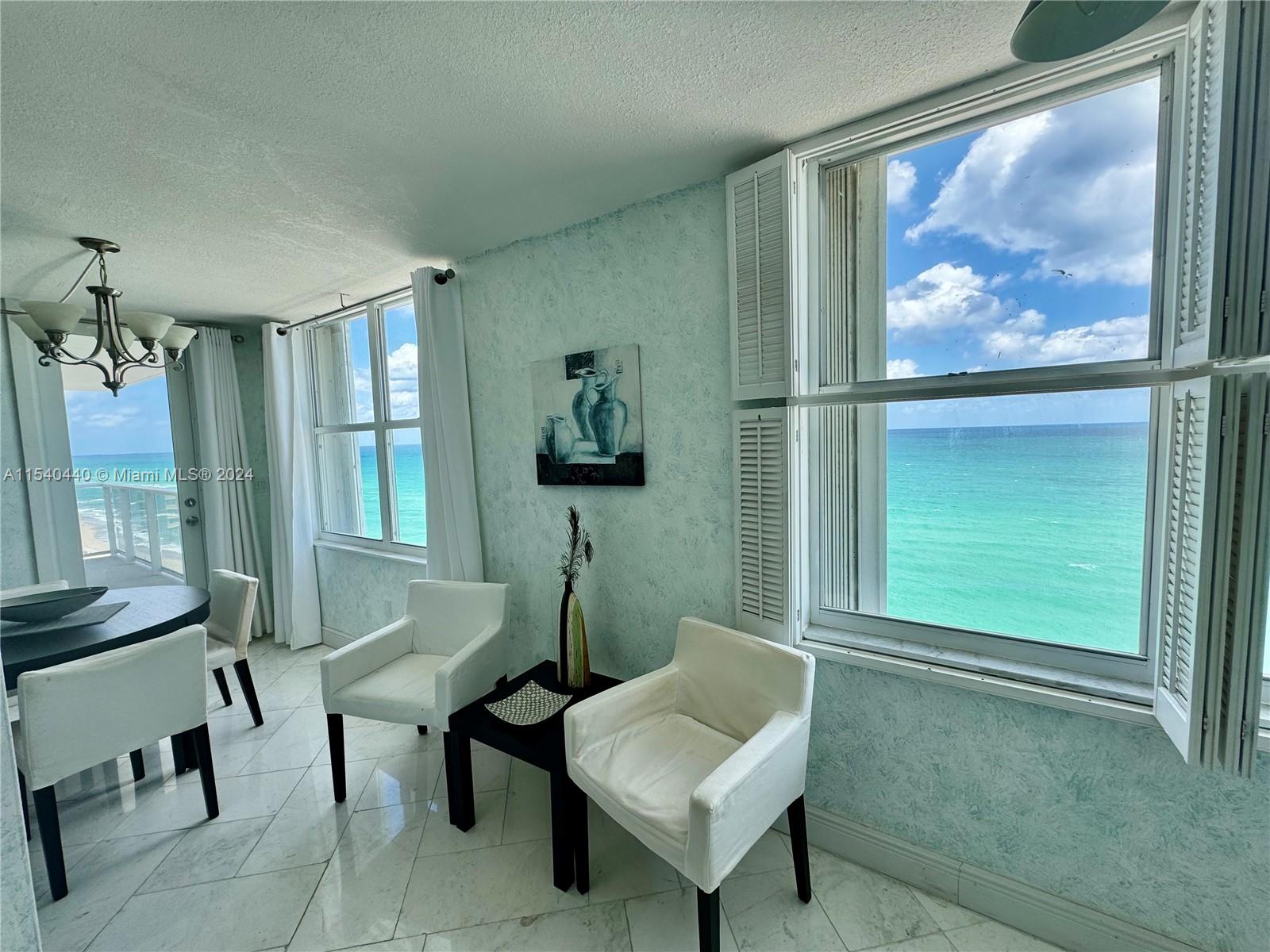 View From the Foyer to the Living Room and Kitchen