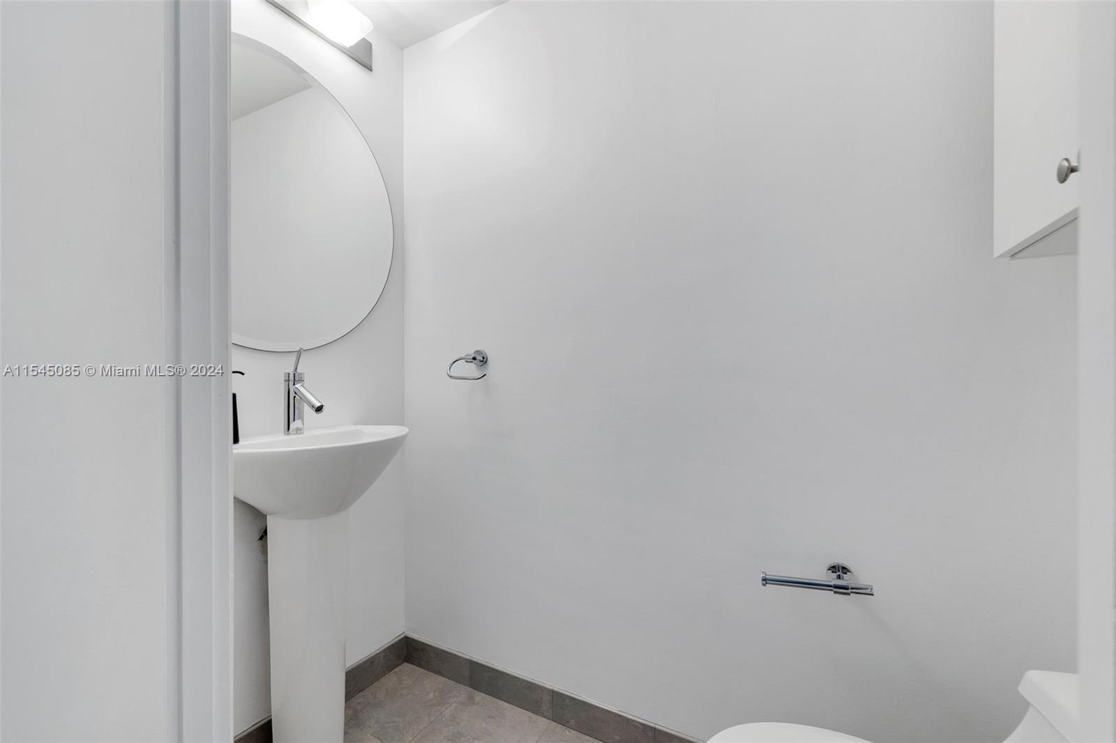 Half Bath in Hallway for Guests