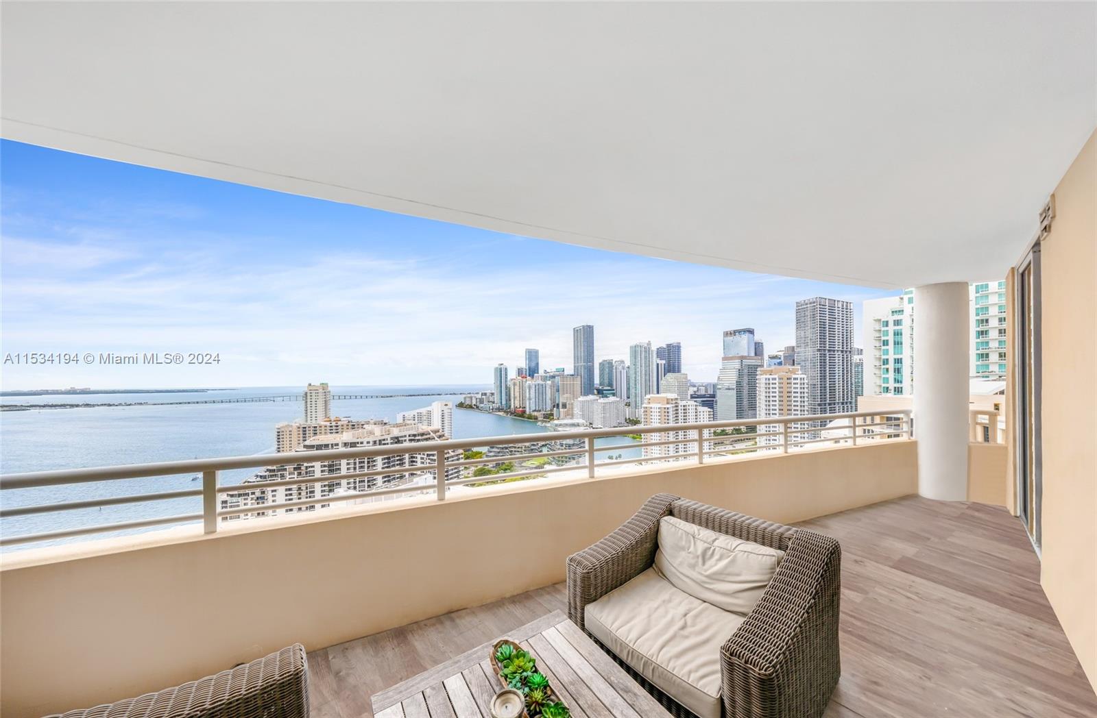 This distingushed condominium overlooking the city of Miami is one of a kind. Located in Brickell key, the most prestigious island in Miami. Professionally decorated and designed in 2015, this modern exquisite unit has, 2 bedrooms and  2 1/2 bath with an open kitchen. This unit line has the largest master bedroom in the building. All Thermador appliances with a stand alone tall wine cooler, washer and dryer, and a large balcony. One of the best views in the city overlooking East, South, and West. Amenities include 2 story gym and a large pool look over the ocean, interior Racquetball courts and more. The unit is kept in perfect condition and ready for move in. Perfect for singles, couples, or a small family.