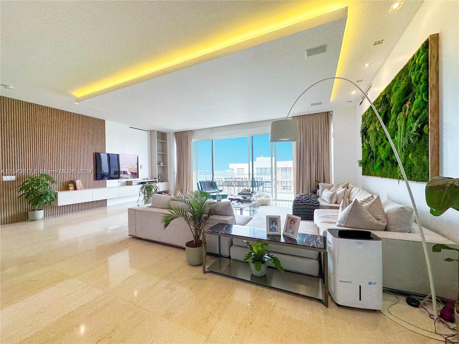 Gorgeous renovated condo in luxurious Bal Harbour 101! This 2,525 sqft gem offers exceptional views, living space & amenities. Gaze at the ocean & bay on your large private terrace while you entertain. PH8 boasts elegant features like 11 ft ceilings, limestone flrs, modern lighting, electric blinds, Italian finishes, Hi-End built-in closets by Molteni & Dada & polished Hans Grohe fixtures by Patricia Urquiola in all 4 baths. Living comfort is optimized w/ 4 BD's & a sprawling open layout for entertaining including a hi-end chef’s kitchen by Dada w/ Miele appliances. Elevating the lifestyle is a health spa, rooftop gym, restaurant & Lounge w/ additional upcoming amenities such as pickleball, huge jacuzzi & more! Prime location, walkable to glamorous Bal Harbour Shops & Places of Worship.