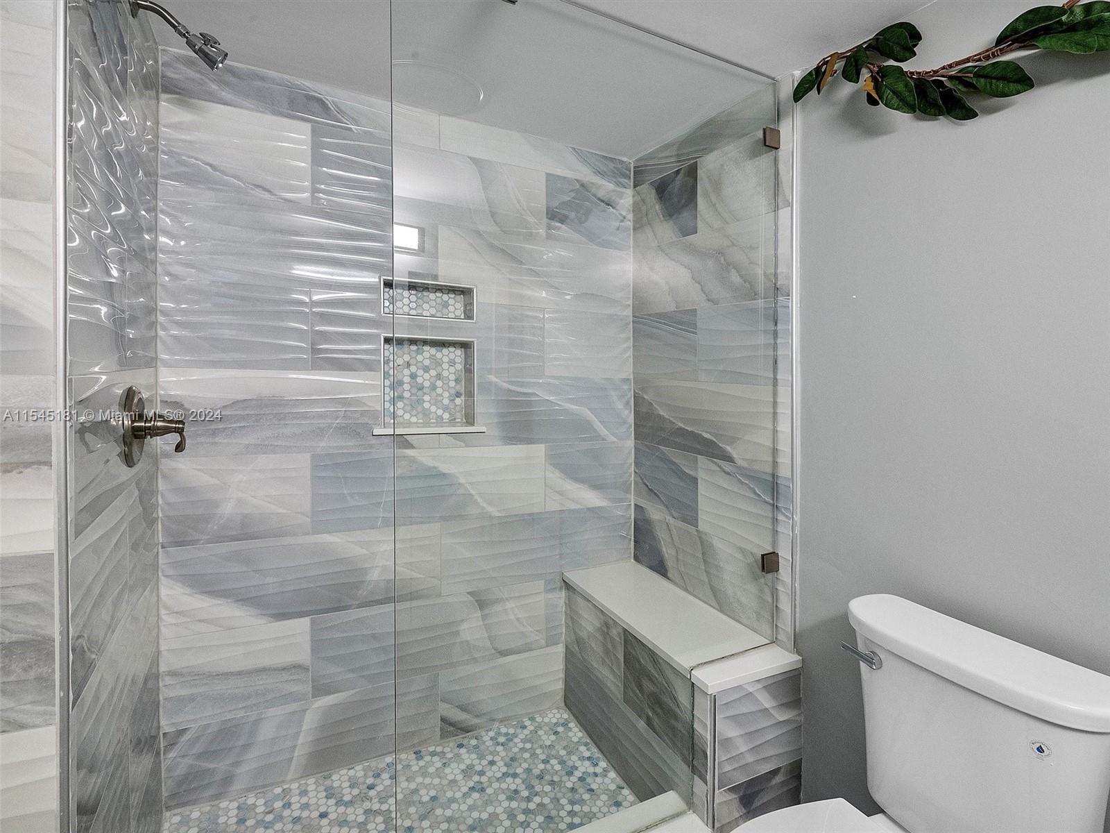 Master Shower w Bluetooth speakers
