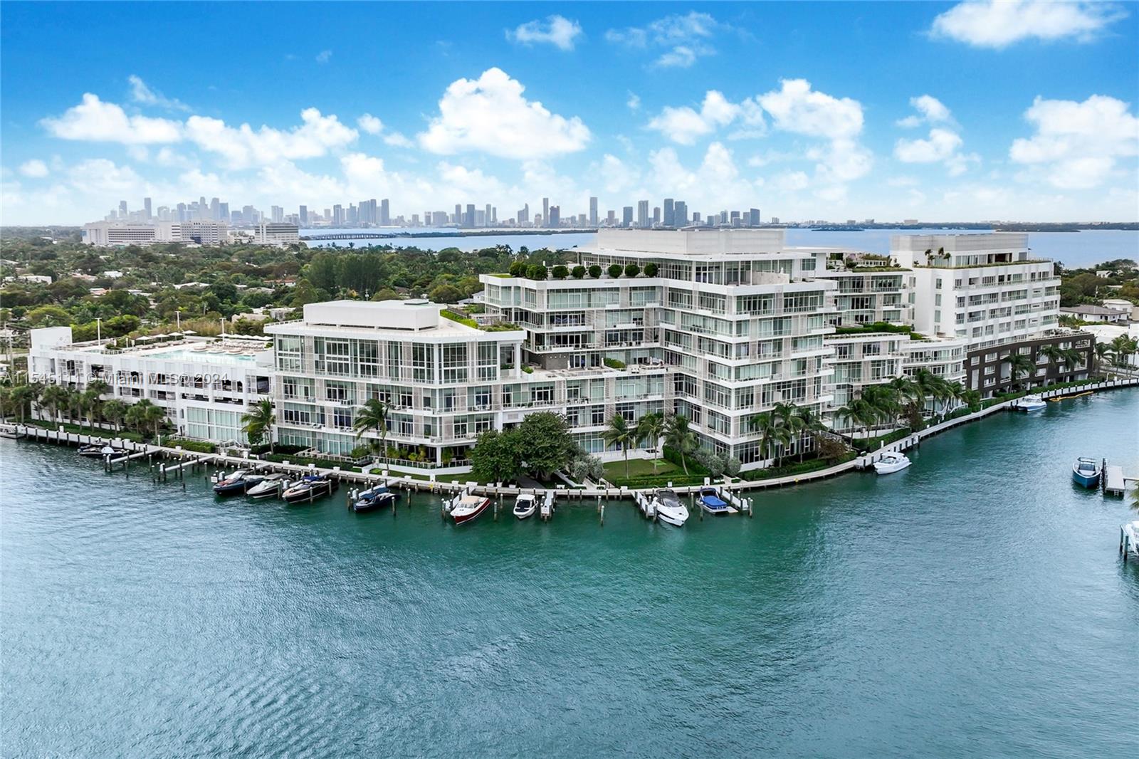 The Ritz-Carlton Residences Miami Beach is situated on a prime waterfront location along Surprise Lake and Waterway designed by renowned Italian architect Piero Lissoni. The property features expansive floor plans with modern & sophisticated design decor elements, custom woodwork, ceiling lighting, floor-to-ceiling windows, tasteful finishes. The brand ensures exceptional service and attention to detail, providing residents with a lifestyle of unparalleled luxury and comfort. The location in Miami Beach offers convenient access to the city's vibrant cultural scene, upscale dining, shopping, and entertainment options, making it an ideal choice for those seeking a luxurious waterfront living experience in one of Miami's most prestigious neighborhoods.