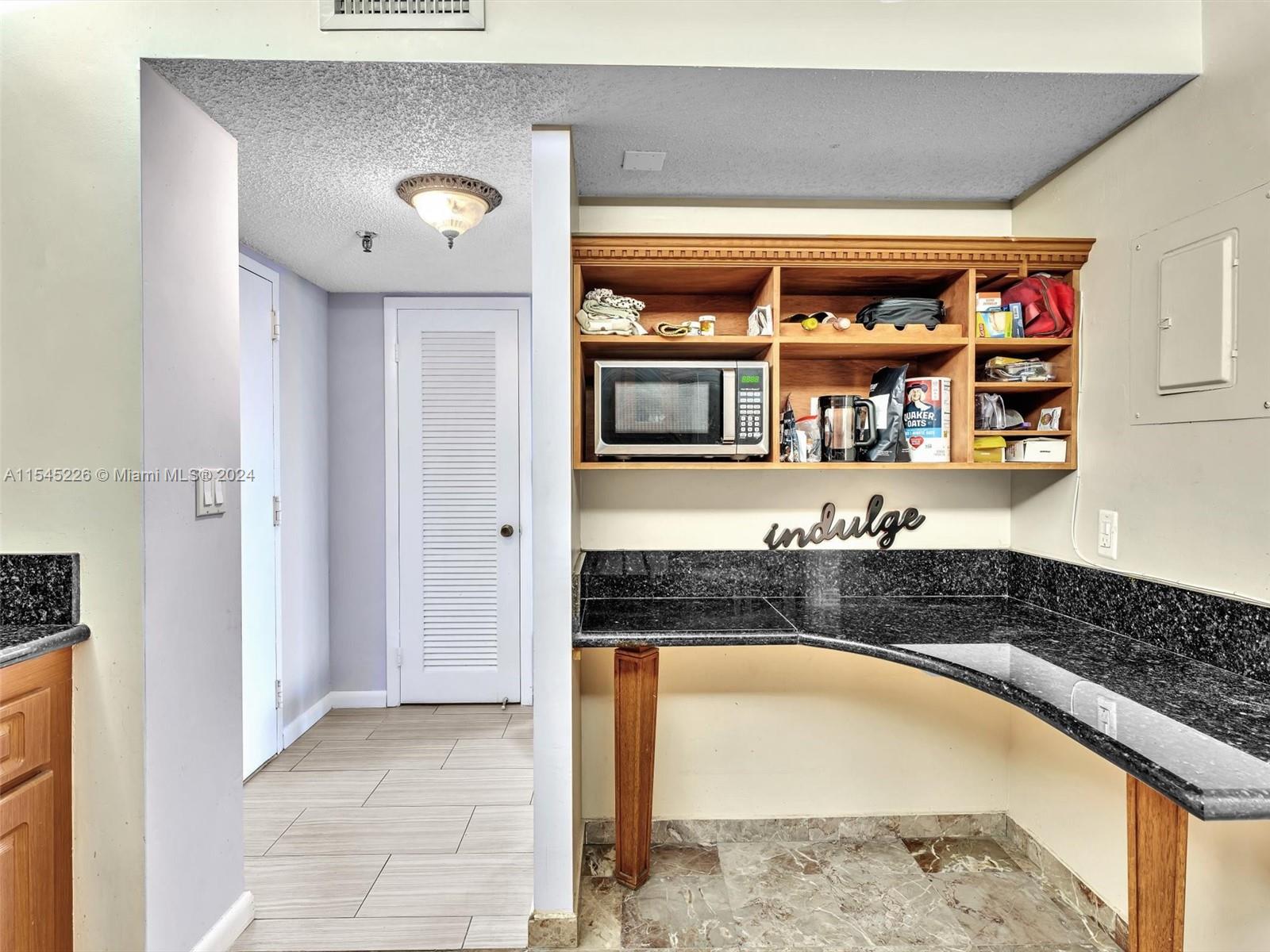 view to laundry room and second bedroom