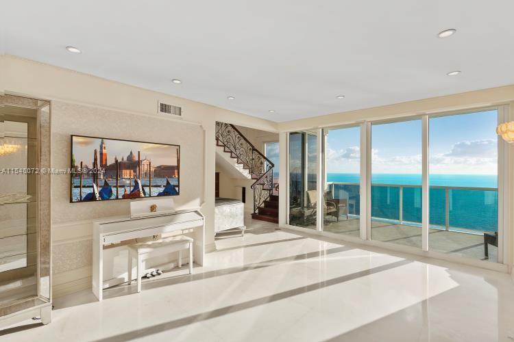FLORIDA RIVIERA IN SUNNY ISLES BEACH, A VERY RARE FOR RENT 2-STORY PENTHOUSE-6, UNIT ON THE 34th FLOOR IN THE OCEANFRONT LUXURIOUS OCEAN-II BLDG. THIS UNIT FEATURES A UNIQUE FLOOR PLAN WITH 3 BED 3,5 BATH (2,665 SF) WITH 12 FOOT-HIGH CEILINGS & PANORAMIC DIRECT OCEAN/INTRACOASTAL/CITY VIEWS. ENJOY 3 HUGE PRIVATE BALCONIES, APROX. 1,000SF ROOF-TOP TERRACE PERFECT FOR ENTERTAINING GUESTS OR BARBECUING, PRIVATE ELEVATOR, PRIVATE LAUNDRY-UTILITY ROOM, EUROPEAN KITCHEN, GRANITE COUNTERS, CUSTOM CLOSETS, MARBLE BATHROOMS AND JACUZZI, MARBLE FLOOR THROUGHOUT. VERY ELEGANT AND PERFECT FOR THE MOST DISCERNING CLIENTS. GREAT LUXURY BUILDING FEATURES INCLUDE PRIVATE ELEVATOR, 2-TENNIS COURTS, SPA, SAUNA & STEAM, 2-STORY GYM, HEATED SWIMMING POOL, RESTAURANT, 2 GARAGE PARKING, 24 HRS SECURITY & VALET.