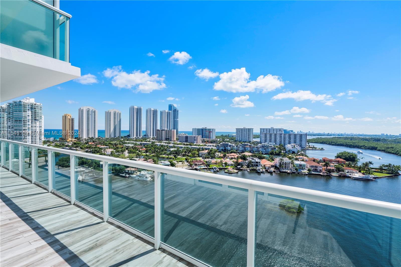 AMAZING NEW OPPORTUNITY at a very saw after split floor plan featuring a large balcony with panoramic Intracoastal views and an extra large walk-in closet in the Master bedroom. The third bedroom is a Den transformed into a guest room with 2 single beds, a full bathroom, and a wardrobe - no window ( video tour ). This luxury 3 Bedrooms/3 bath is fully furnished by Crate & Barrel, The living room features lots of natural light. Full-Service building, 24hrs front desk, gym, TENNIS COURT, a pool deck with lounge, bar, and large Pool, Marina, and Valet. Walking distance to Sunny Isles Beach, near Aventura Mall, Bal Harbour Mall, best schools, and world-class restaurants. Featuring a resort-style pool deck with a full-service private Marina and boat with wet and dry slips, for all residents