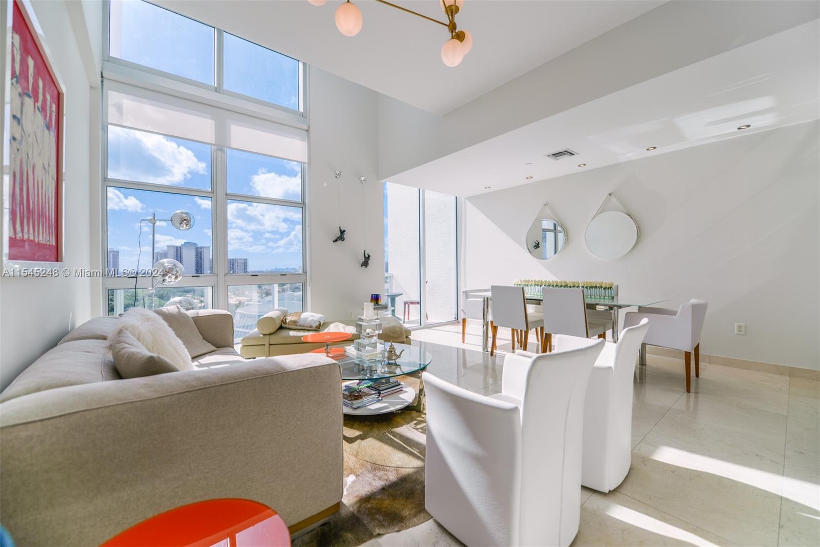 Experience luxury living in this unique two-story,  2-bedroom, 2-bathroom penthouse condo boasting city and intracoastal views in Aventura, FL. Spanning 1,205 square feet, this unit features a large open kitchen with a breakfast bar overlooking the dinning and living spaces.  The second floor features a nearly 500 square-foot private rooftop terrace perfect for entertaining. Residents enjoy access to a range of upscale amenities including a pool, gym, sauna, hot tub and valet. With one parking space included, this penthouse offers the epitome of sophistication and convenience in one of Aventura's most sought-after locations, close to A+ schools, shopping, dinning, Aventura Mall, Beaches and Brightline's newest Aventura station. Don't miss your chance to call this luxurious condo home.