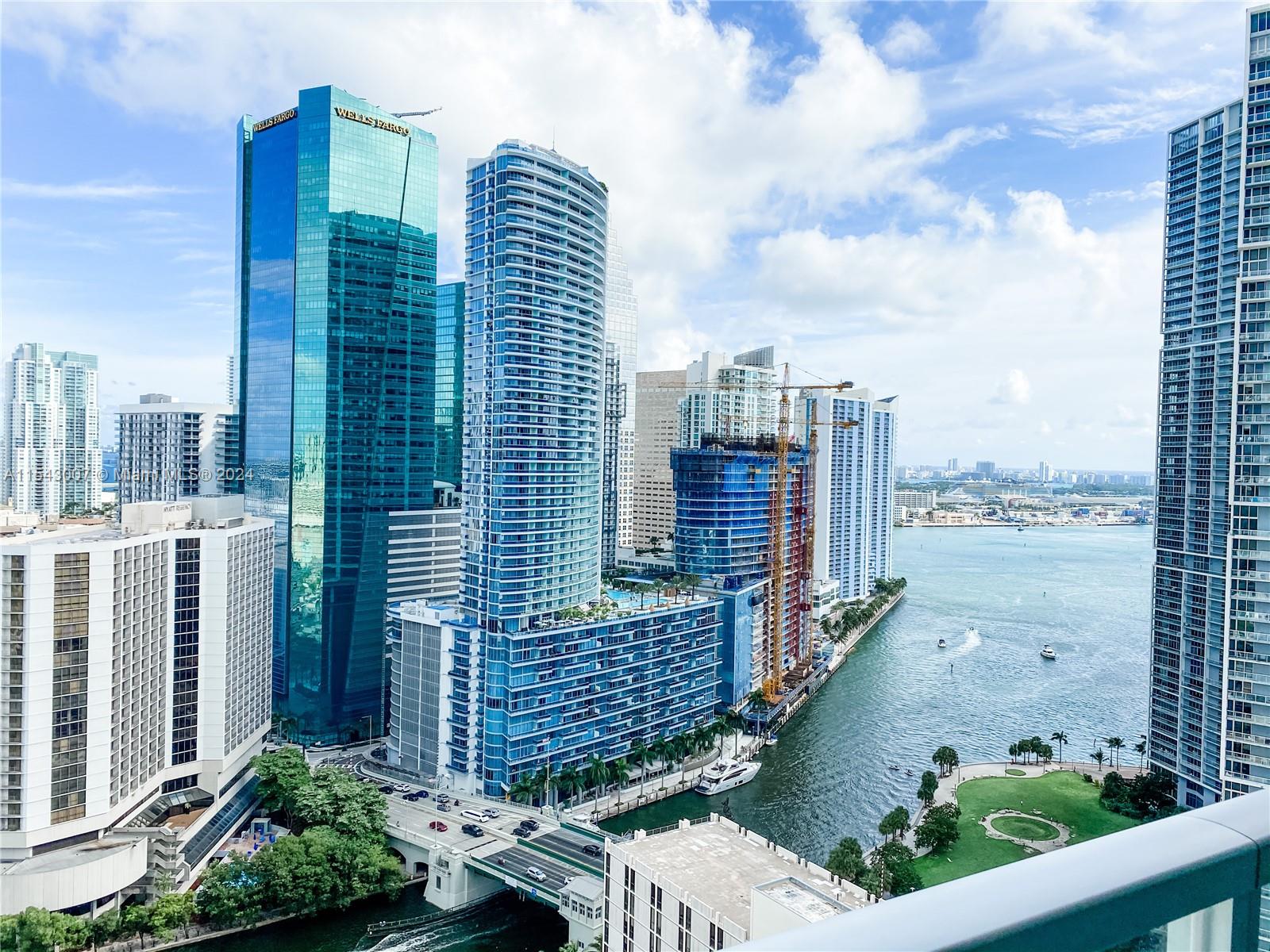 Rent rare 2 Bed/2 Bath unit at 500 Brickell West with gorgeous views of the Miami river, Biscayne bay & Miami downtown. Unit is spacious with 1,111 sq ft, featuring a split floor plan, floor-to-ceiling impact windows, blackout roller shades in bedrooms, stainless steel appliances in the kitchen & waterproof vinyl floor! Unit has 2 walk-in closets and master bath with shower, jacuzzi & bath tube. Unit has a private washer & dryer. Unit comes with 1 complementary parking space located conveniently on the 5th floor. Cable & Internet is included. Luxurious amenities include 42nd-floor rooftop pool & sundeck, 11th-floor infinity pool, Spa, Club rooms, theatre, 24/7 Concierge, 24-hr Valet, and Fitness center. Conveniently located nearby Brickell City Center, Downtown Miami, Metrorail & I-95.