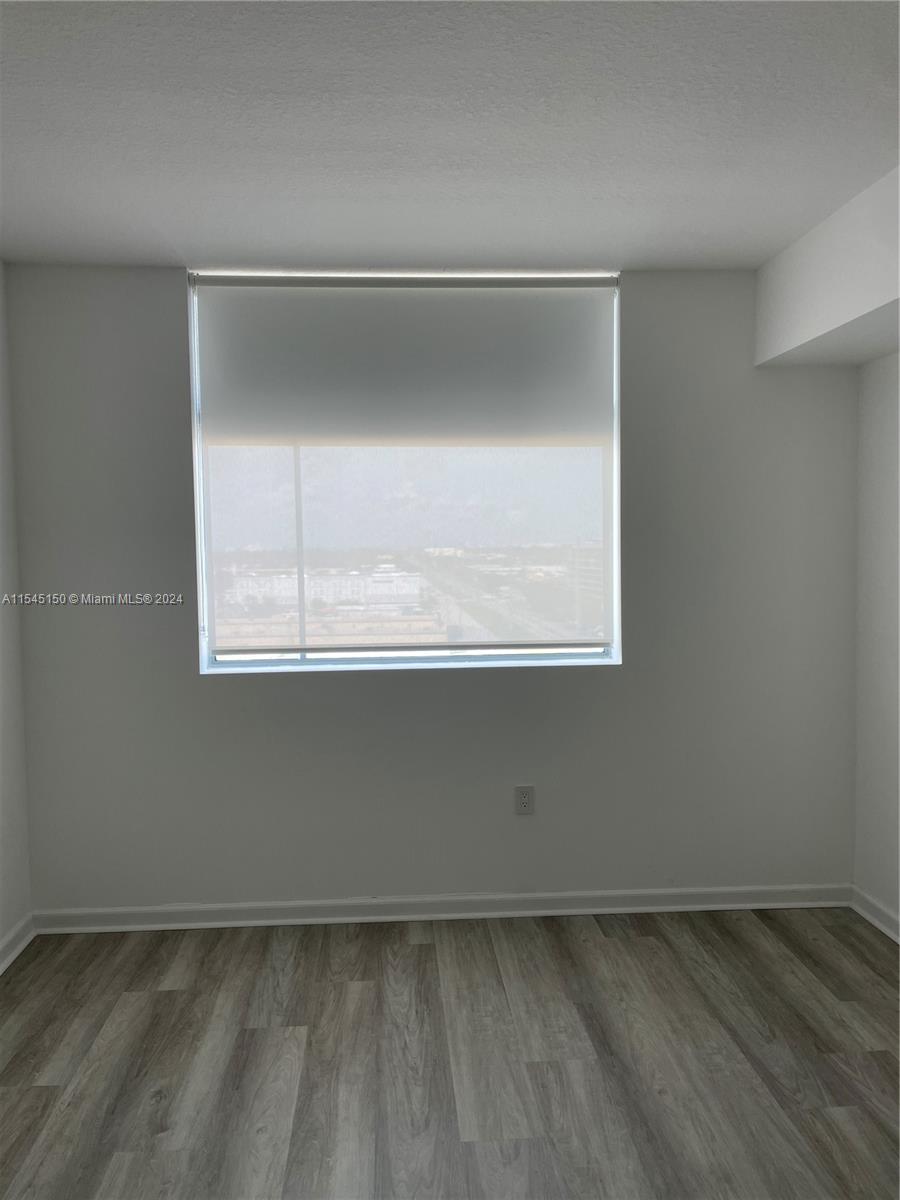2nd Bedroom with window treatments