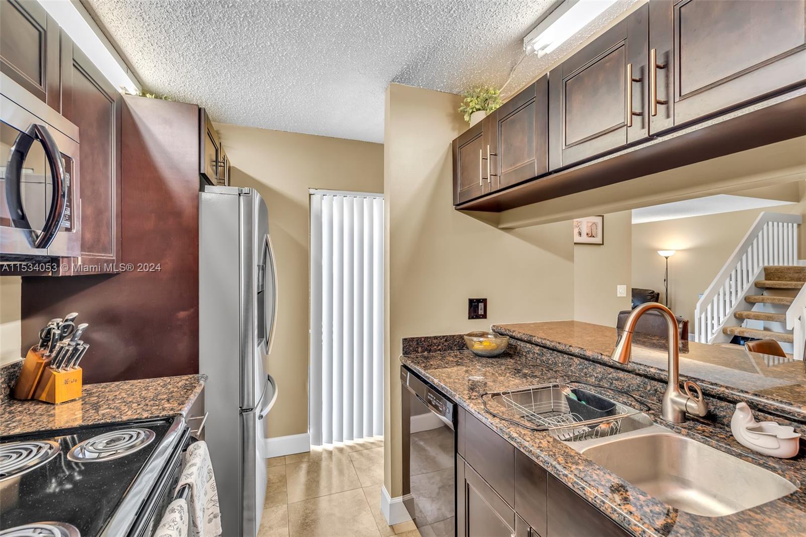 New kitchen w/stainless steel appliances