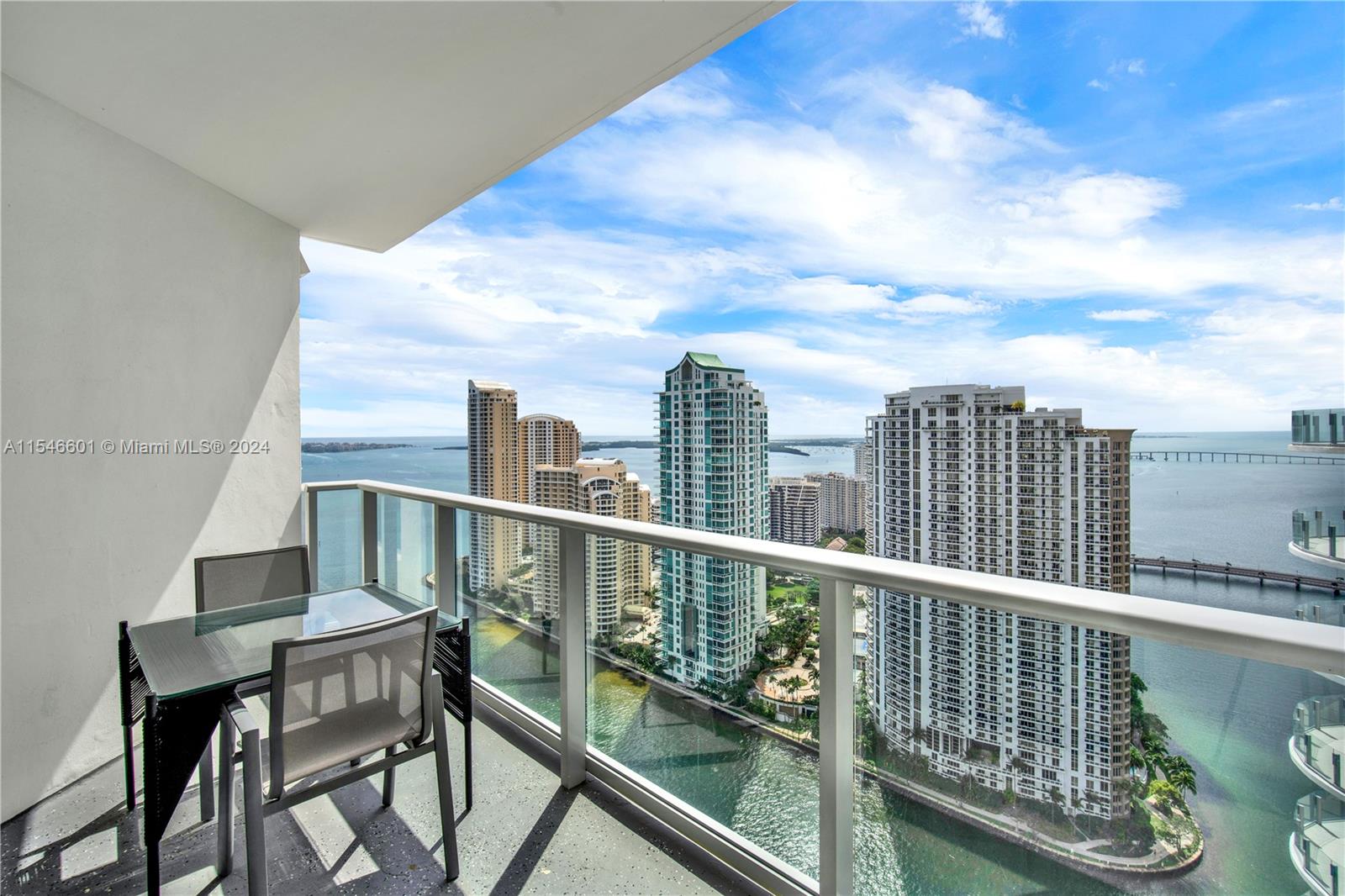 Welcome to one of the most famous locations in Miami! Discover Miami Downtown/Brickell lifestyle with close distance to local restaurants, Bayfront Park, Whole Foods, and Metromover station  is just one block away. And of course, become a neighbour of iconic Aston Martin Residences! Enjoy stunning Bay Front & Brickell Key island view from your balcony every day. Beautiful 2/2 unit is in great condition; it was recently updated with window treatments in living room and main bedroom, new washer/dryer, upgraded AC components & thermostat, new oven hood and light fixtures.  Unit is furnished with new stylish furniture to make your moving process easy and fast! Basic cable & Internet is included plus 1 assigned parking space.
