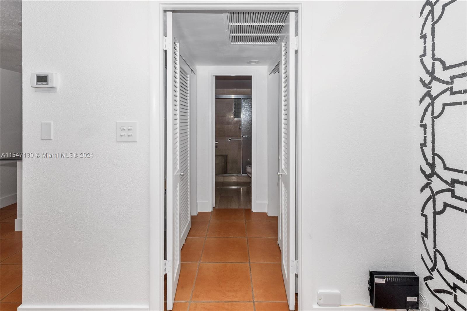 Hallway with 2 closets