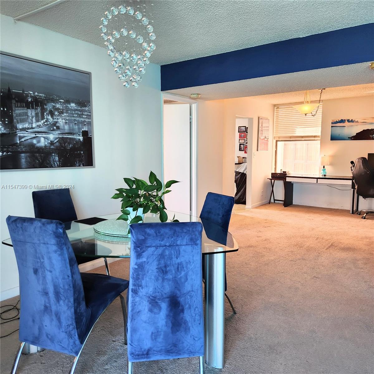 Part of living room used as dining area by Tenant