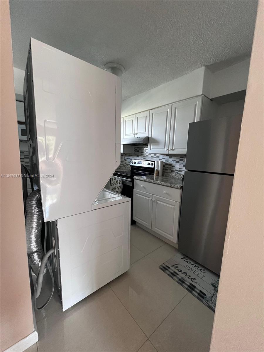 ANOTHER SIDE OF THE KITCHEN