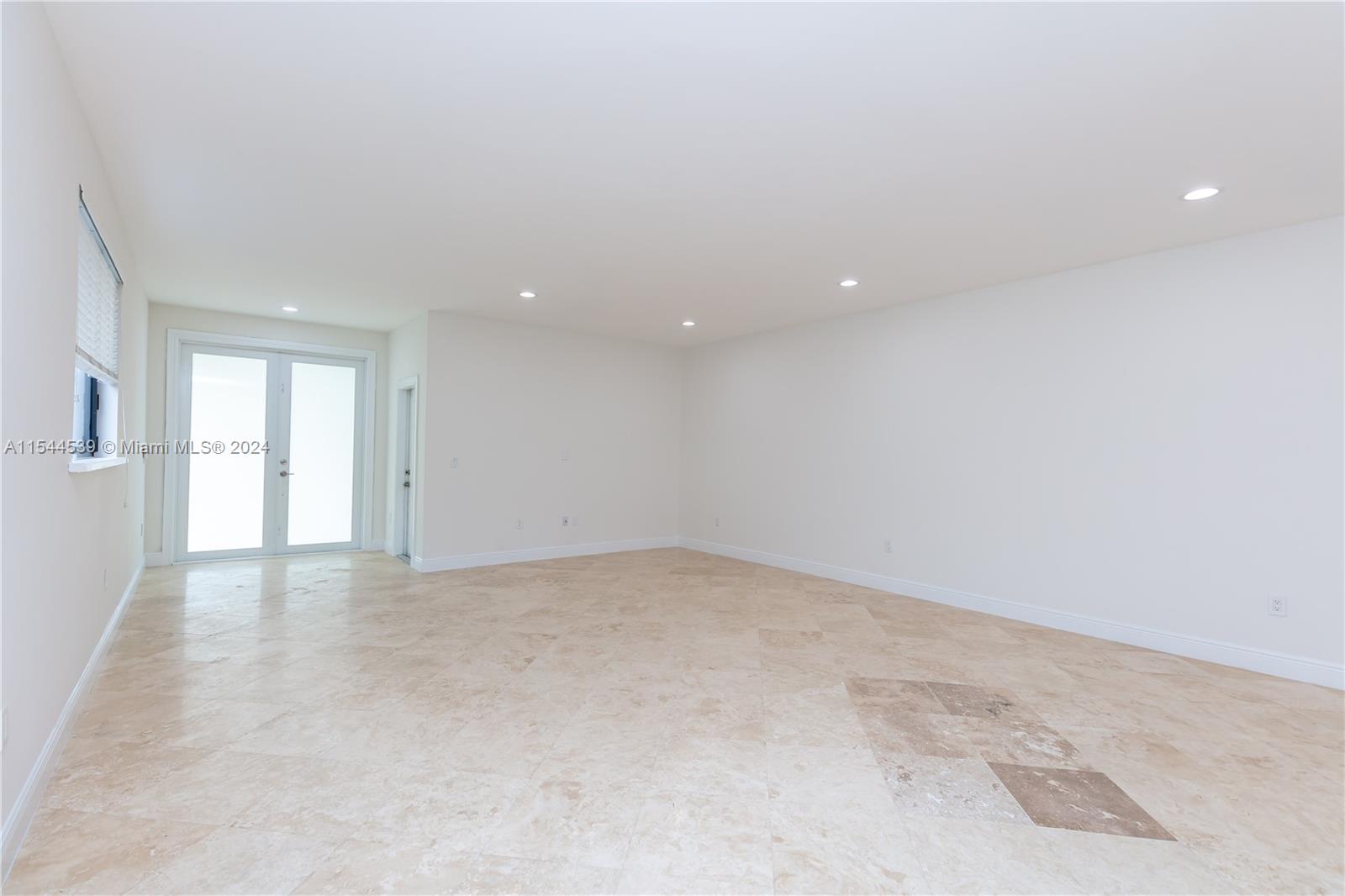 looking towards the front door and living area