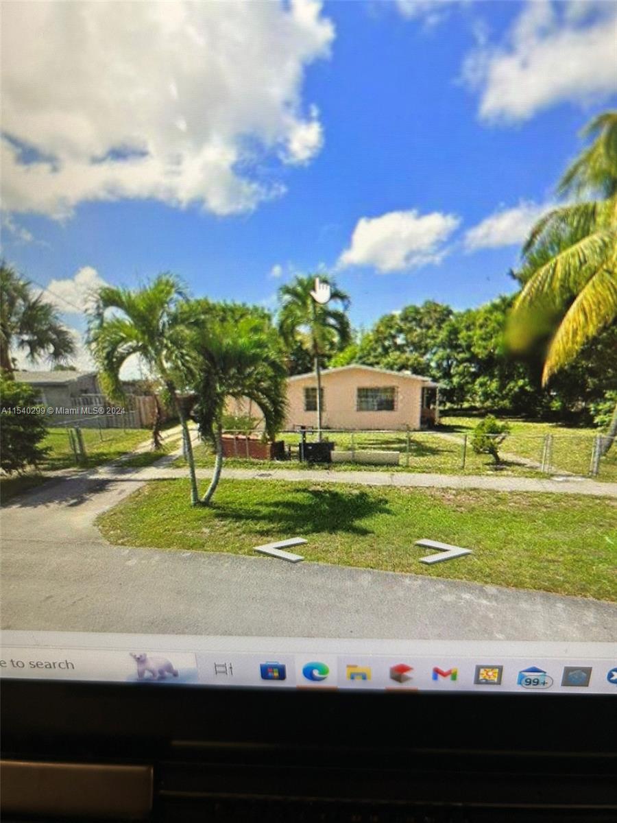 left front driveway, center house right side of property large land  area