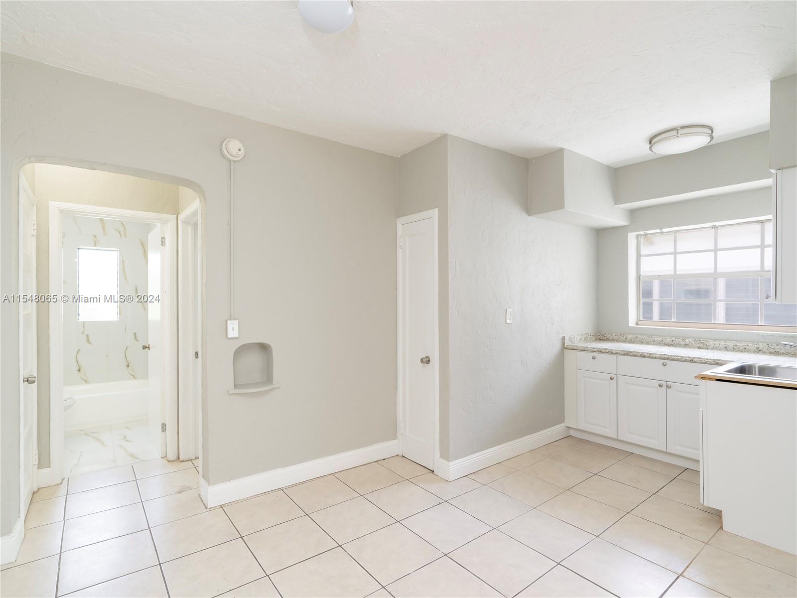 Electric range and refrigerator not pictured.