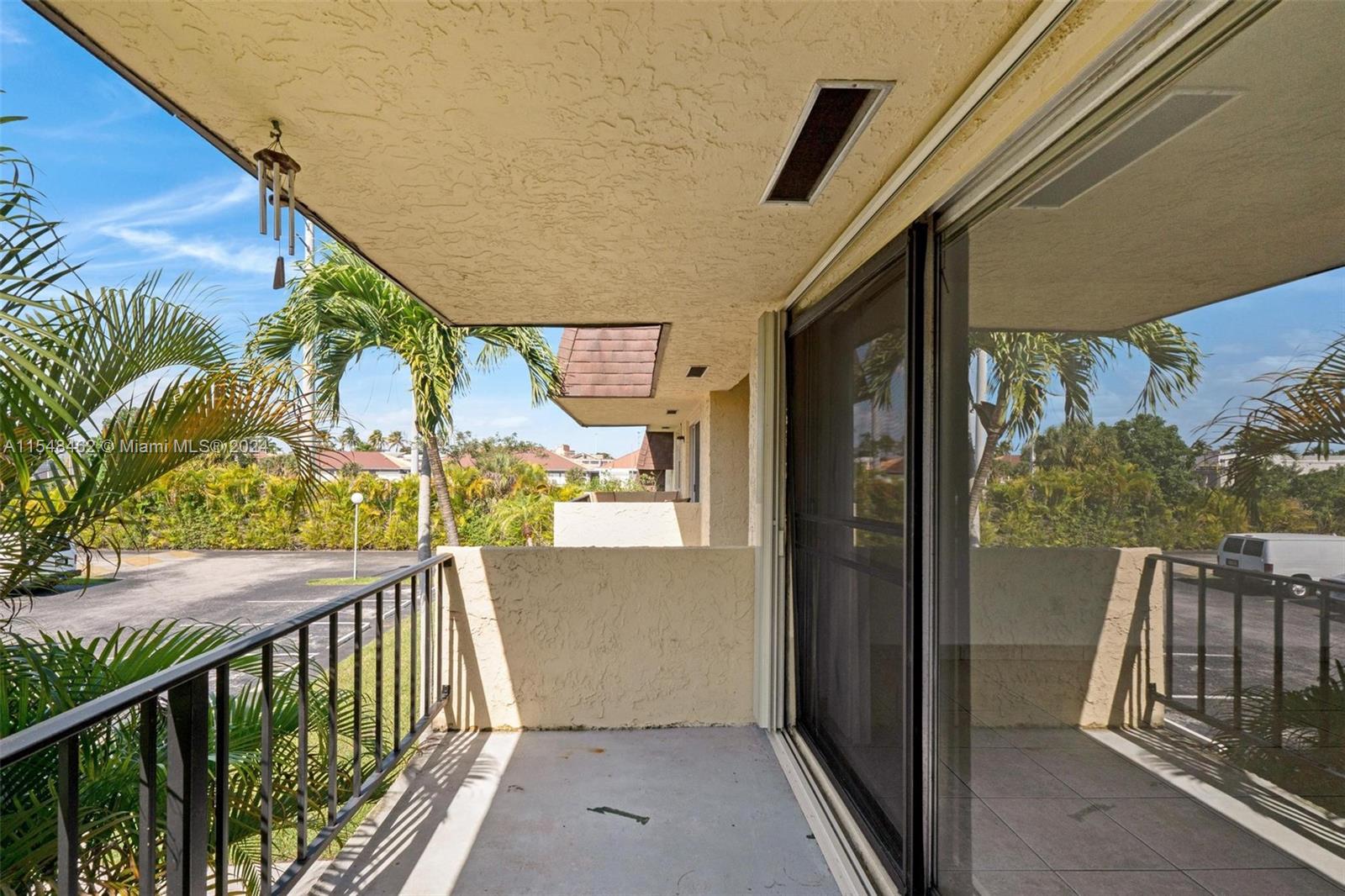 Entry into either the dining area which is to the left or to the living room which is door to the right