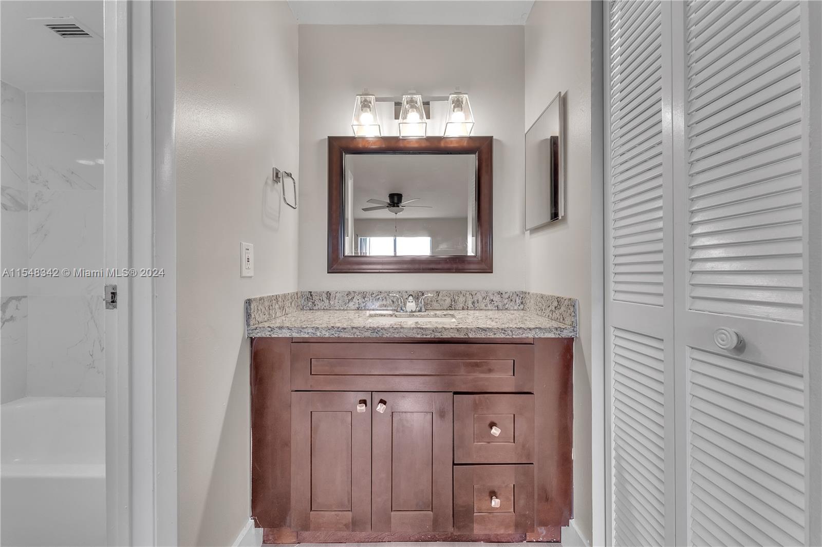 Master Bathroom w/Glimpse of Tub & Shower