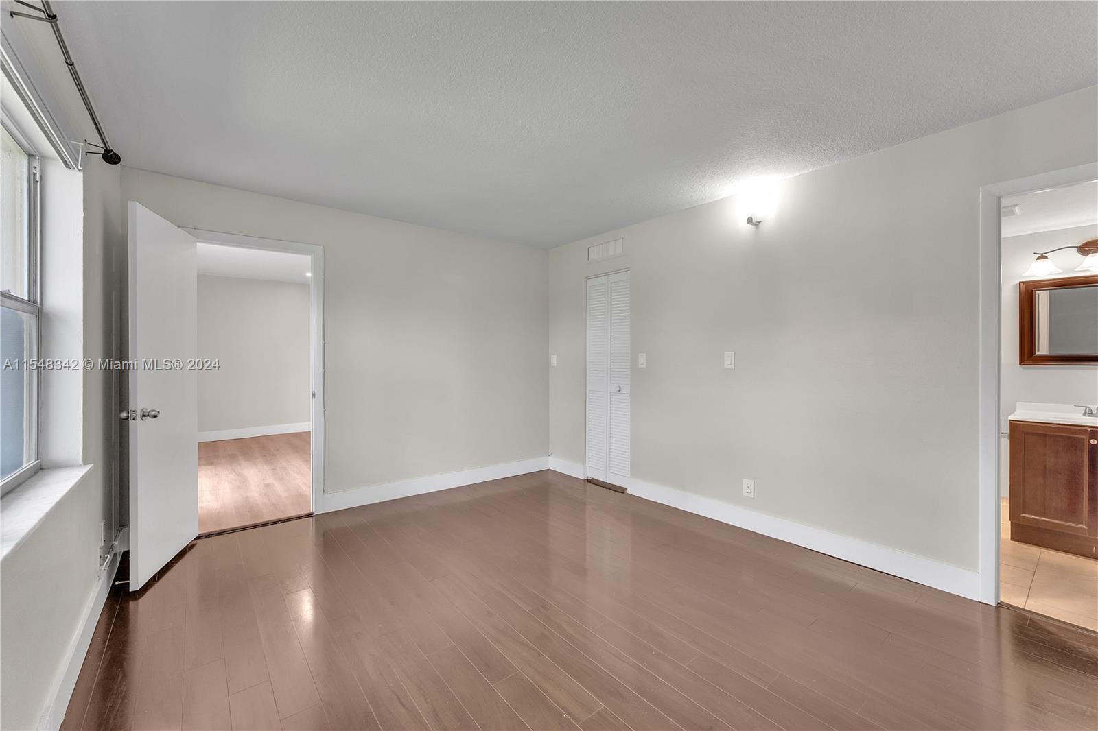 Bedroom 2 w/Glimpse of Bathroom 2