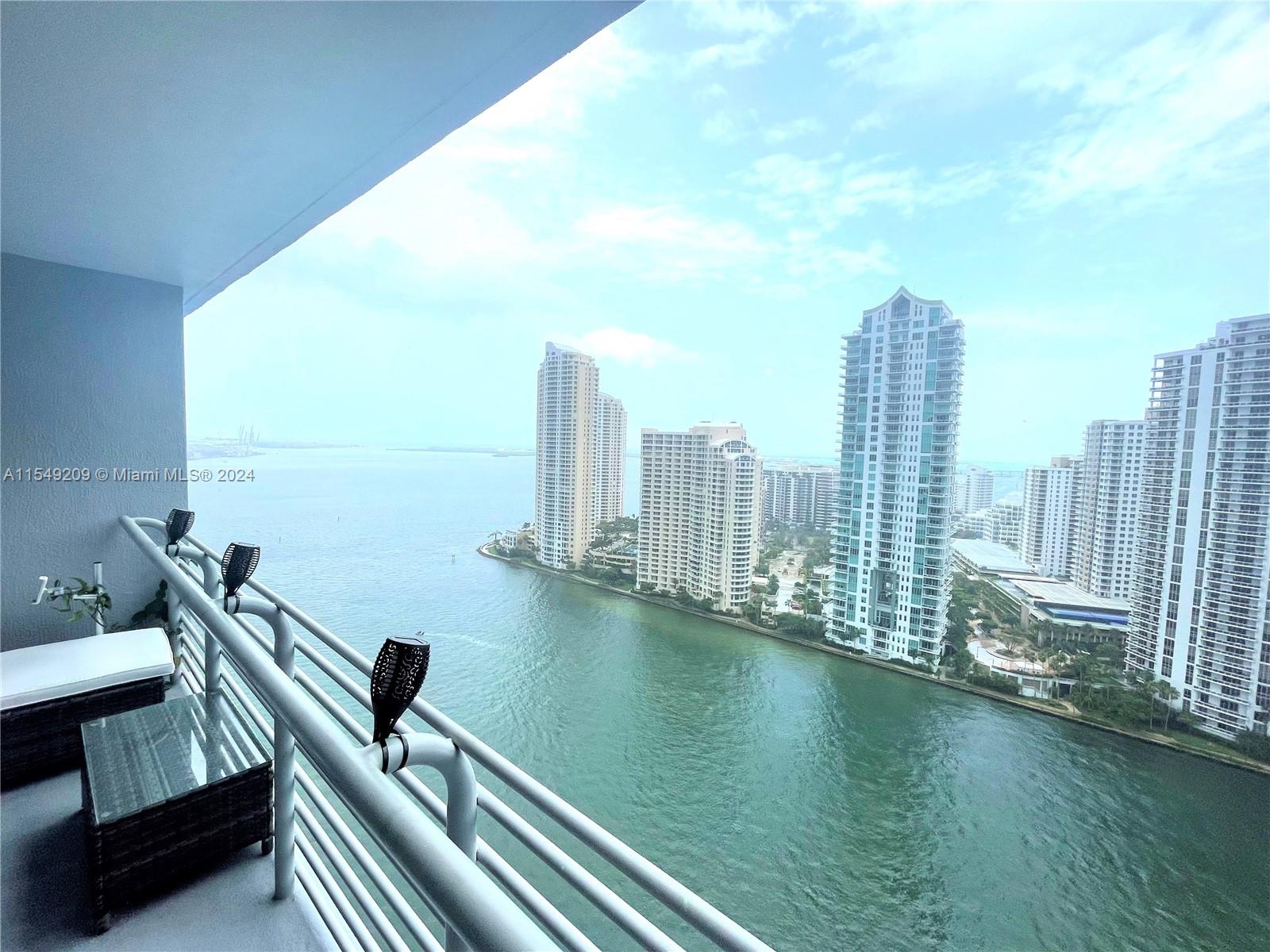 Amazing open Bay and Brickell skyline view, direct-waterfront building, spacious high floor apartment, 24X24 white porcelain floor throughout, southern exposure with spectacular views of Miami River, Bay and Brickell Key. This is the largest one bedroom and the most desired line in the building with a large balcony, spacious walk-in closet. Italian kitchen cabinets, Granite countertops, stainless steel appliances, marble top vanity, you'll find a wealth of amenities, 2 swimming pools, two fitness centers, a jacuzzi, saunas, a community room, 24-hour security and concierge, convenience store, valet parking, a business center, within walking distance, including a nearby Whole Foods, the Metro-Mover, AA Arena, Bayside, Brickell, as well as an array of diverse shopping and dining options.