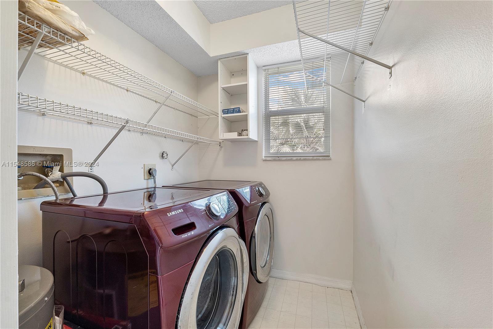 Laundry room in the unit