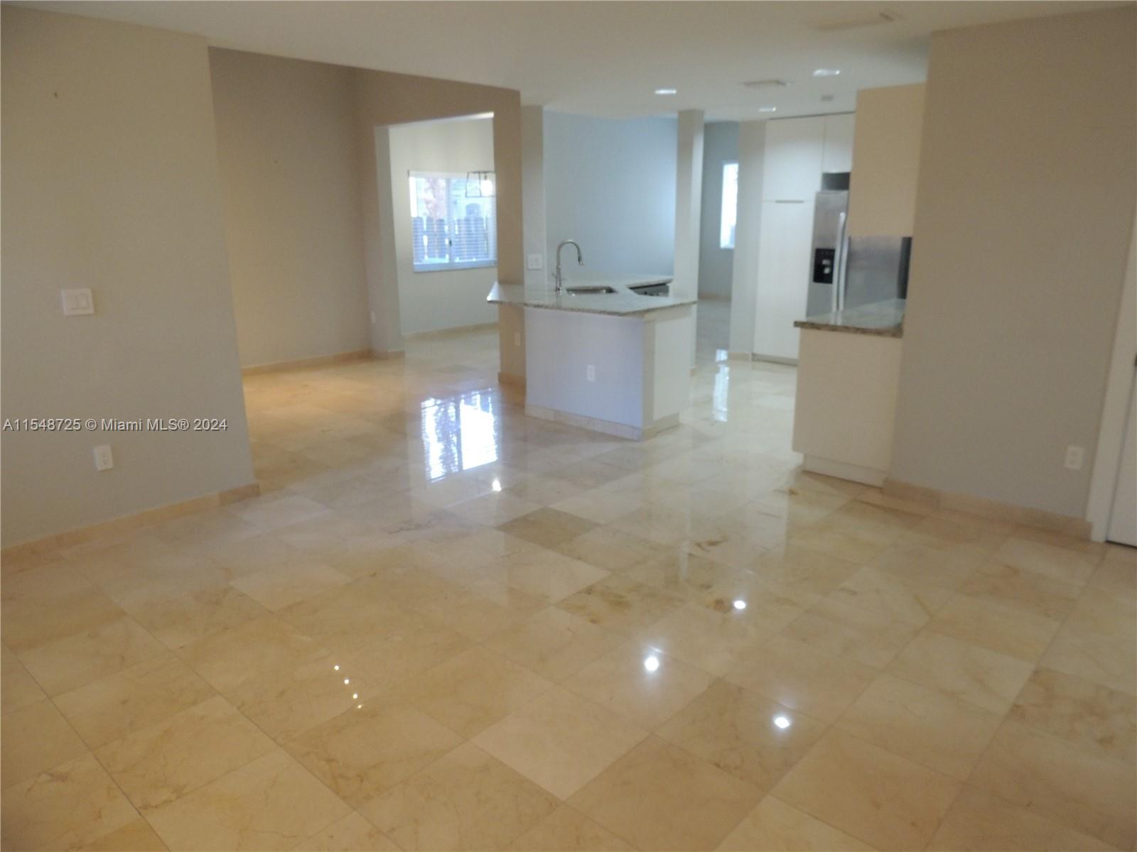 Family room view to kitchen