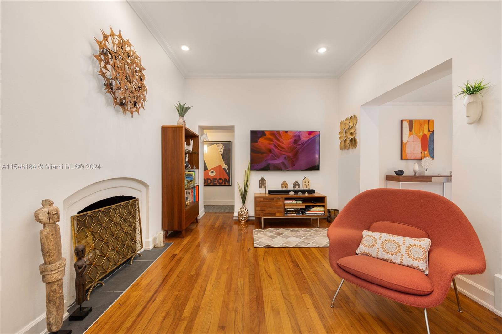 Living room with wood burning fire place