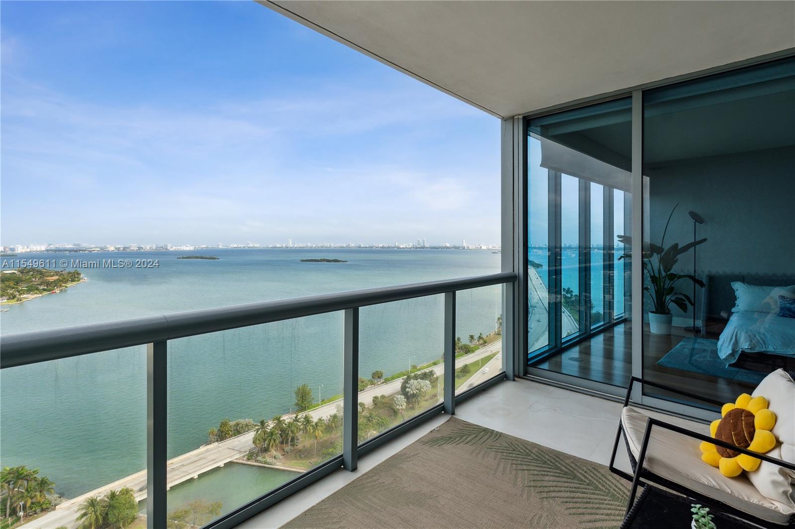 Discover luxury living in this stunning 2-bedroom, 2.5-bathroom condo boasting unrivaled views of the Miami skyline & Biscayne Bay. The expansive floor plan features 9-ft floor-to-ceiling glass windows that illuminate the modern finishes. Step into the open kitchen, equipped with stainless steel appliances. Take advantage of the walk-in closet & large balcony, offering breathtaking & unobstructed waterfront views. Resort Style amenities include a gym, 2 pools, hot tubs, theater, sauna, game room, business center, bbq area, & more. The location is minutes from the Design District, and provides easy access to the vibrant downtown, Brickell, & airport. With Miami Beach just moments away, this residence offers luxury & convenience in the heart of Miami. 1 assigned parking space + 1 valet.