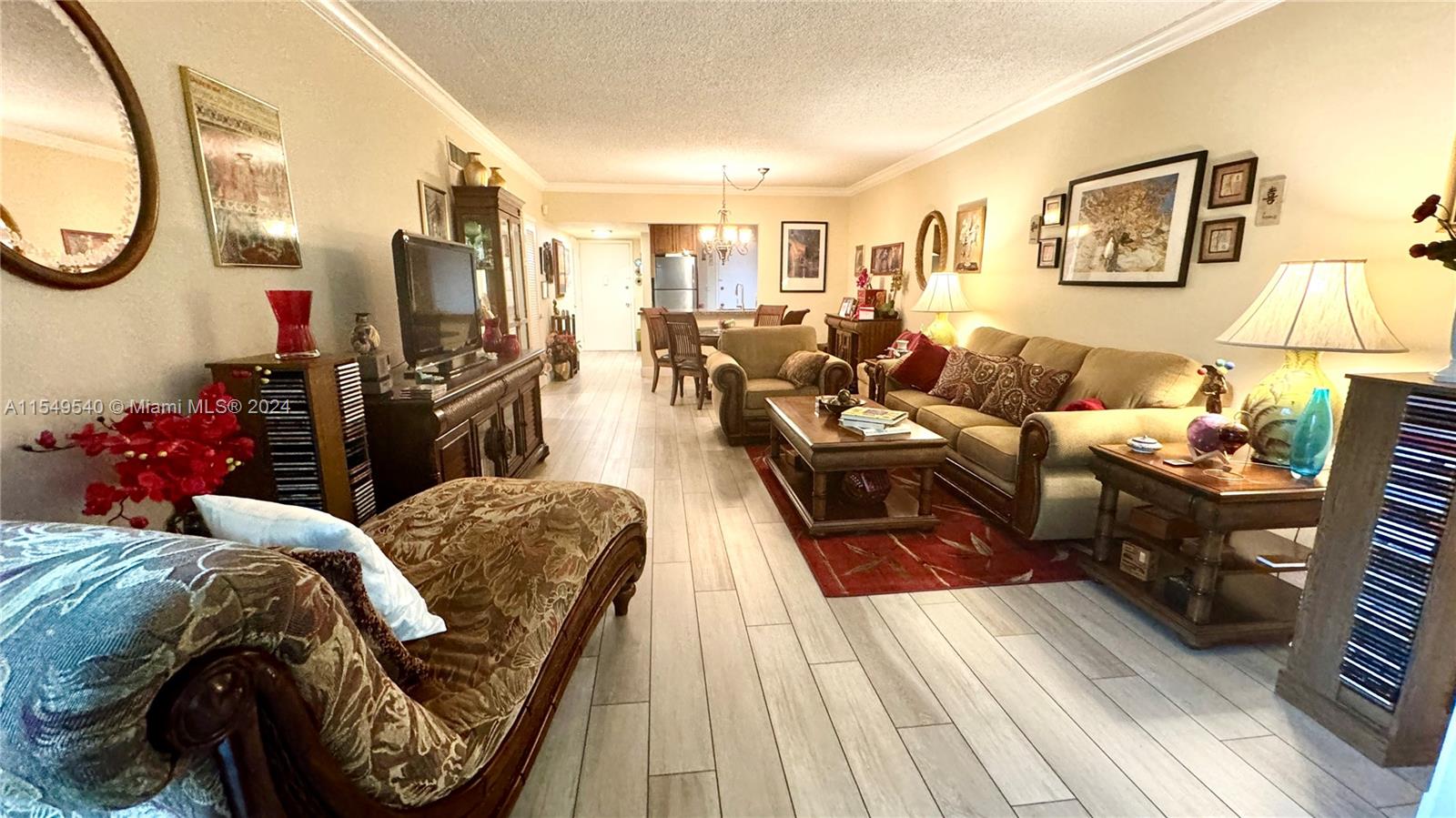 View of living room from sun room - Furniture is also for sale
