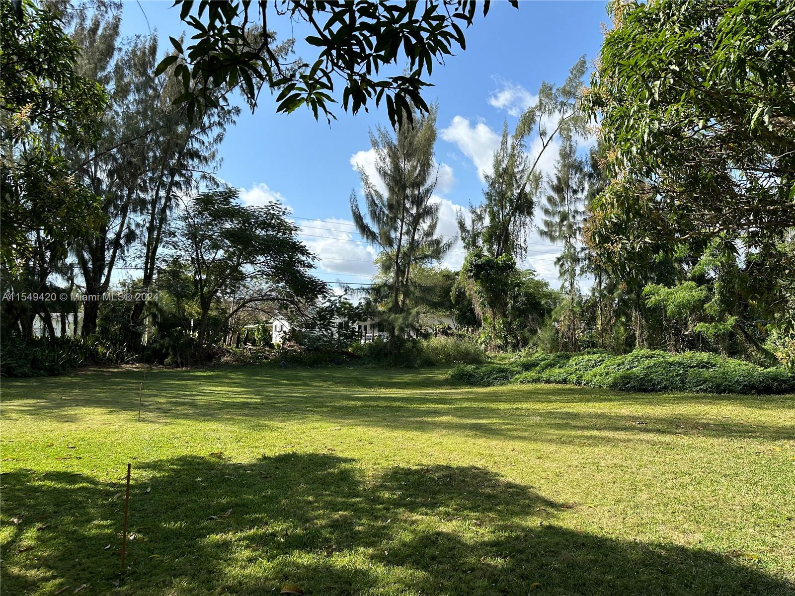 Amazing opportunity for an investor, or end user. Undoubtedly, one of the most desirable lots in Palmetto Bay! This 1.91 Acre lot (83,200 Sq. Ft.) is beautiful, and allows the next owner to build their dream home without limitations. Whether it's your dream estate, or several homes (subject to re-platting/zoning), this is the perfect lot. This lot contains beautiful vegetation, and has the openness necessary and required for building your dream mid-century modern estate, or other style of home as well. There are two homes currently on the property, but one folio. These homes were built in the 1930's and are most likely knock downs. Buyer must be a cash buyer, and we can close at buyer's discrepancy. Sold for "land value."