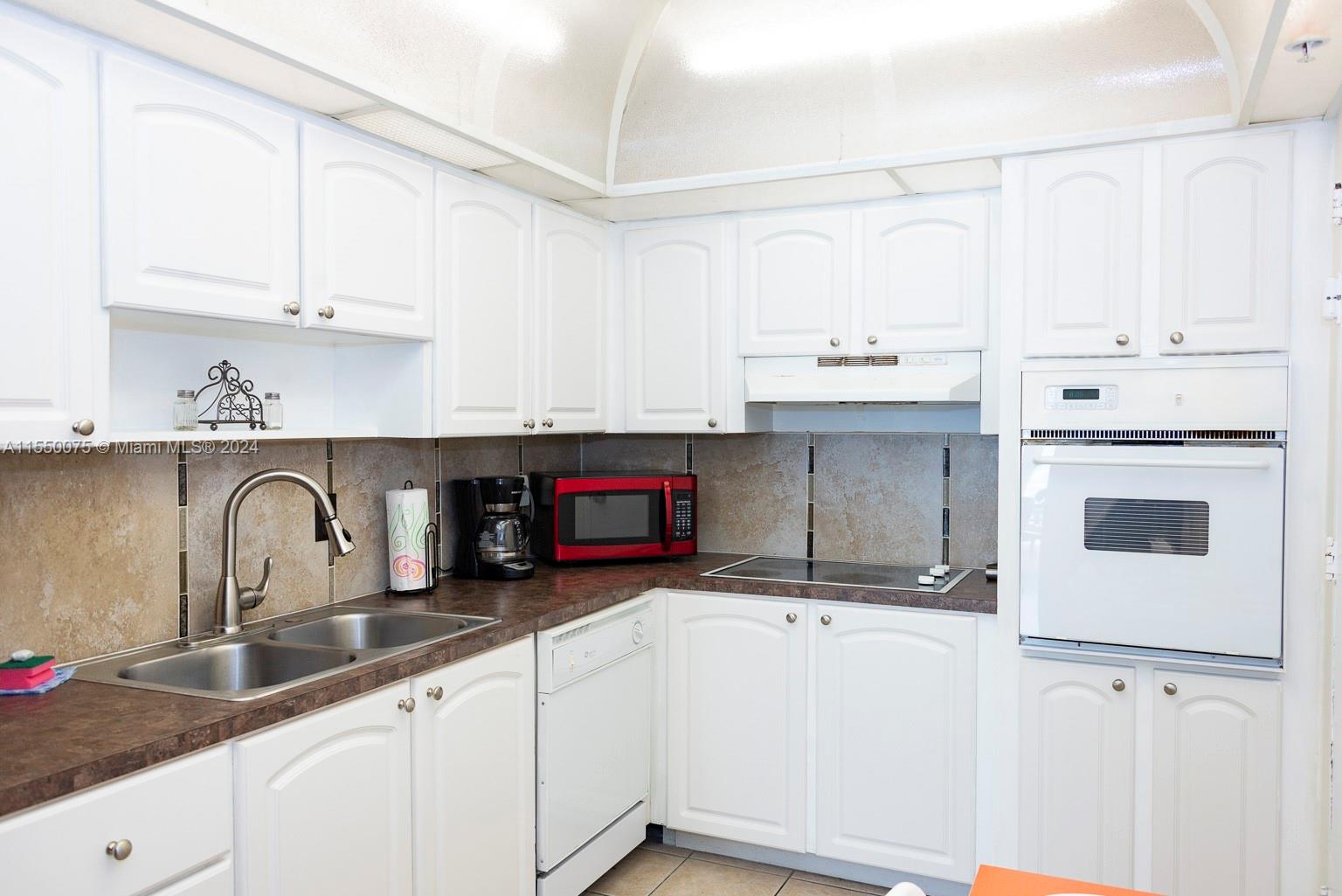 Master bedroom with access to balcony of bedroom and living room. In suite bathroom with walk in shower and walk in closet.